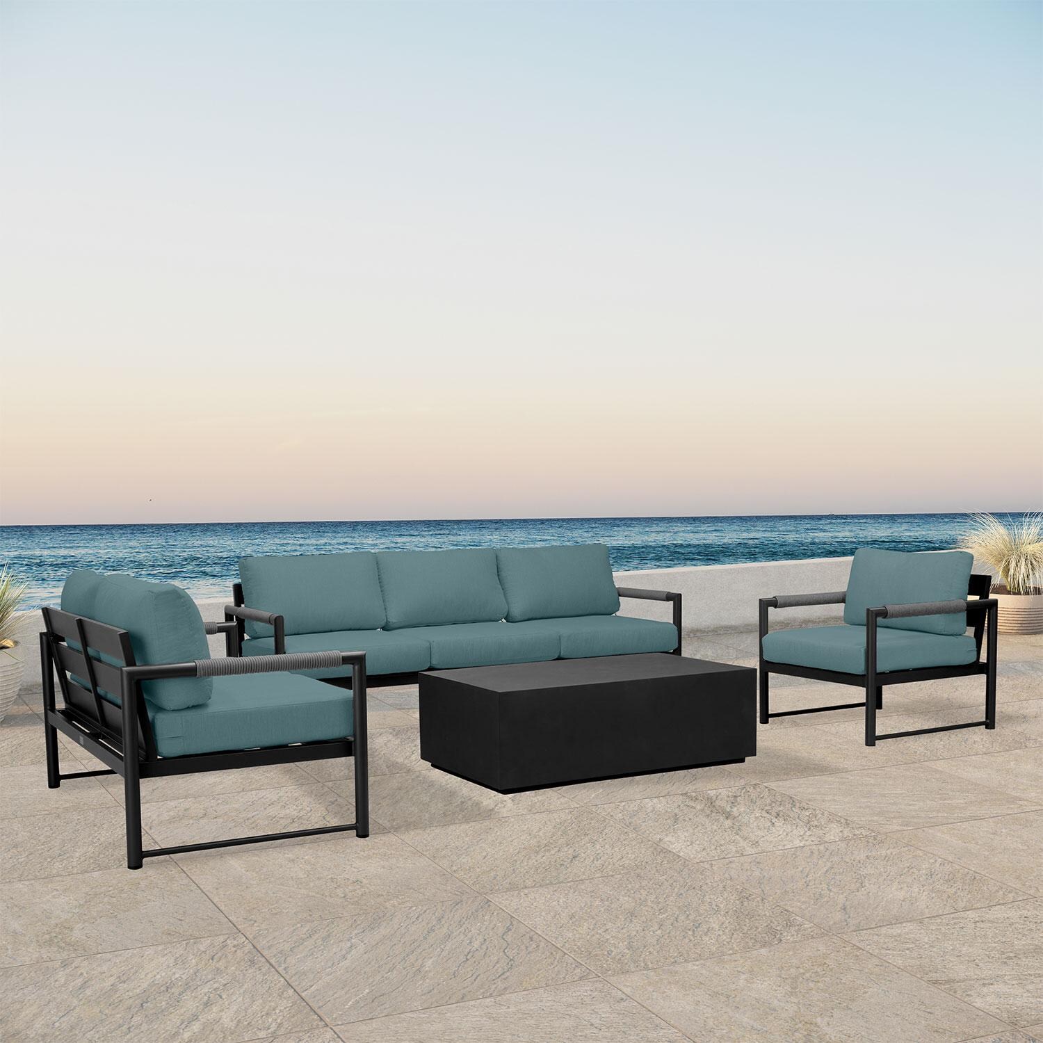 Lakeview AVEBAY-BK-CO-SET137-CL Avenue Bay Black/Carbon 4 Pc Sofa Loveseat Set - Cast Lagoon - Angled On Patio - Lifestyle thumbnail