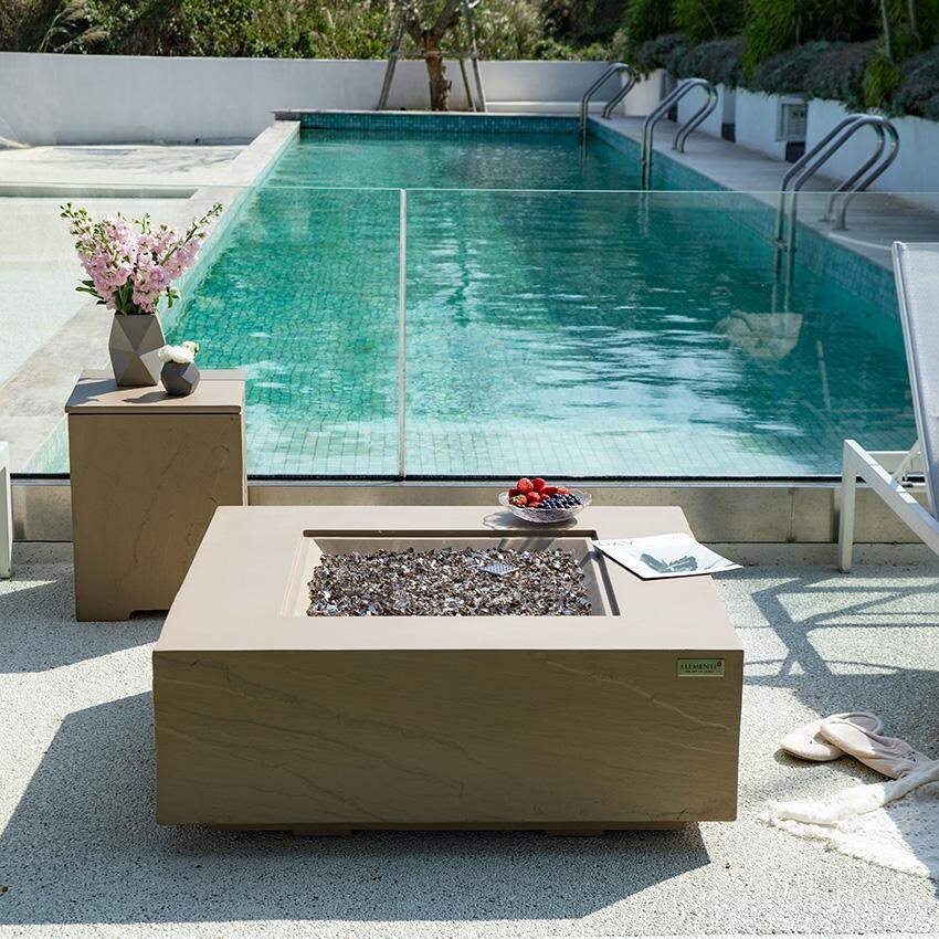 Elementi Uluru OFG411SY-LP 40-Inch Propane Sunlight Yellow Fire Pit Table - Fire Table Unlit By Pool thumbnail