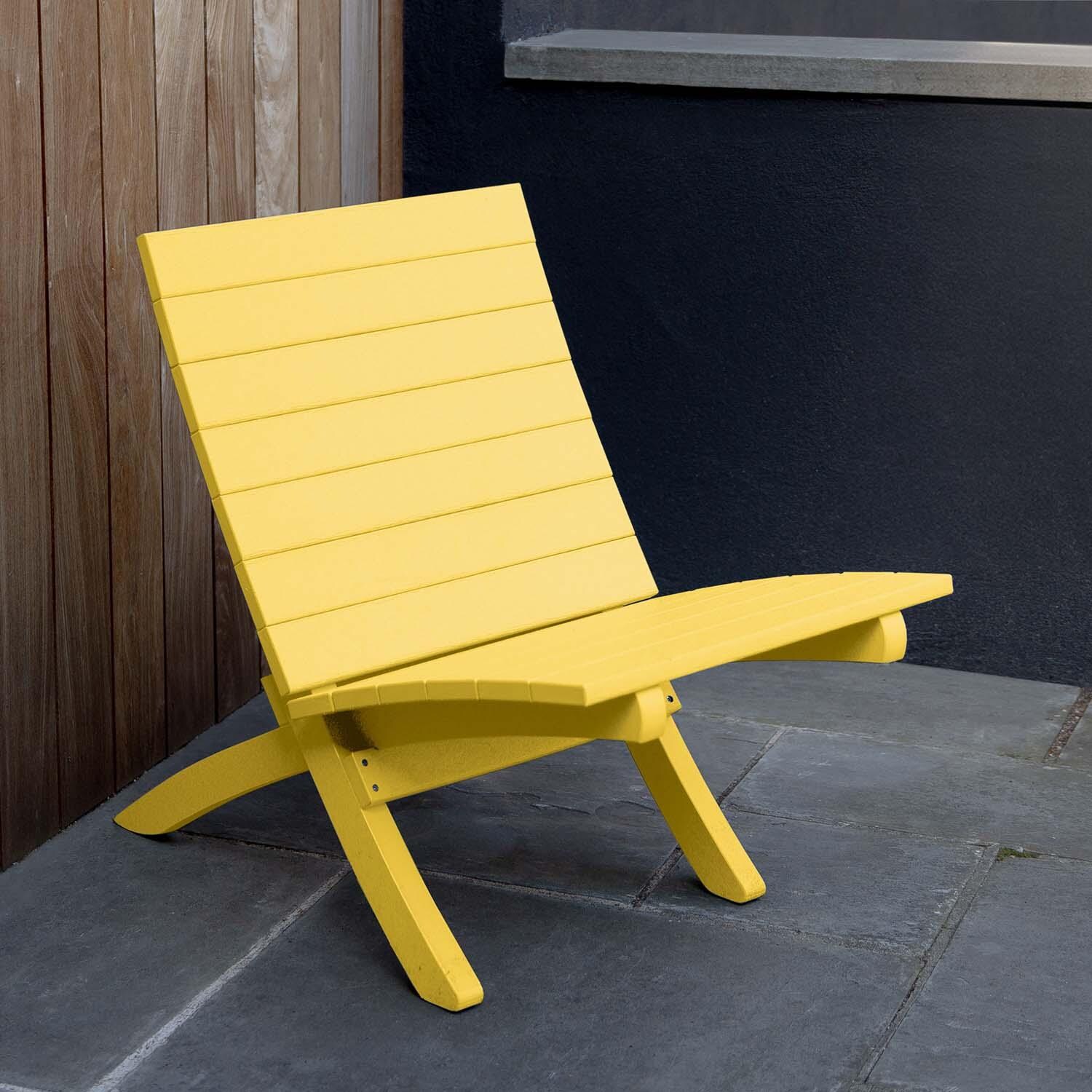 Hazel Cove Recycled Plastic Folding & Stacking Dining Side Chair in Sunbeam Yellow by Lakeview Outdoor Designs - Right Side View - Lifestyle thumbnail