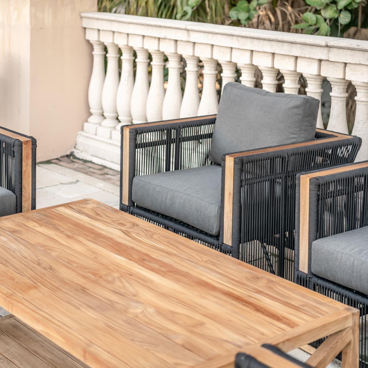 Teak + Table Breeze Olefin Rope & Teak Patio Club Chair in Charcoal/Carbon - Shown w/set (Table not included) - Lifestyle thumbnail