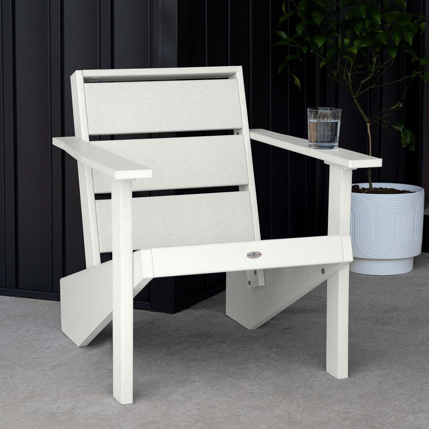 Hazel Cove Recycled Plastic Adirondack Chair in Coconut White by Lakeview Outdoor Designs - Next to Flowerpot - Lifestyle thumbnail