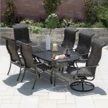 Du Monde 7 Piece Banana Leaf Wicker Patio Dining Set W/ 84 X 42 Inch Oval Dining Table & 2 Swivel Rockers By Lakeview Outdoor Designs image