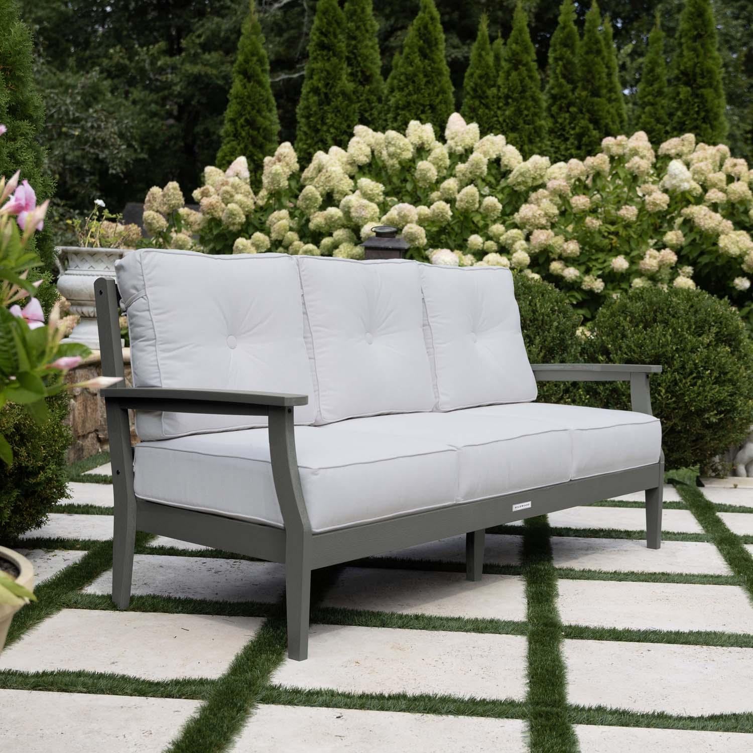 Blushing Bay 3 Person Recycled Plastic Sofa in Bliss Linen/Coastal Teak by Lakeview Outdoor Designs - Side View - Lifestyle thumbnail