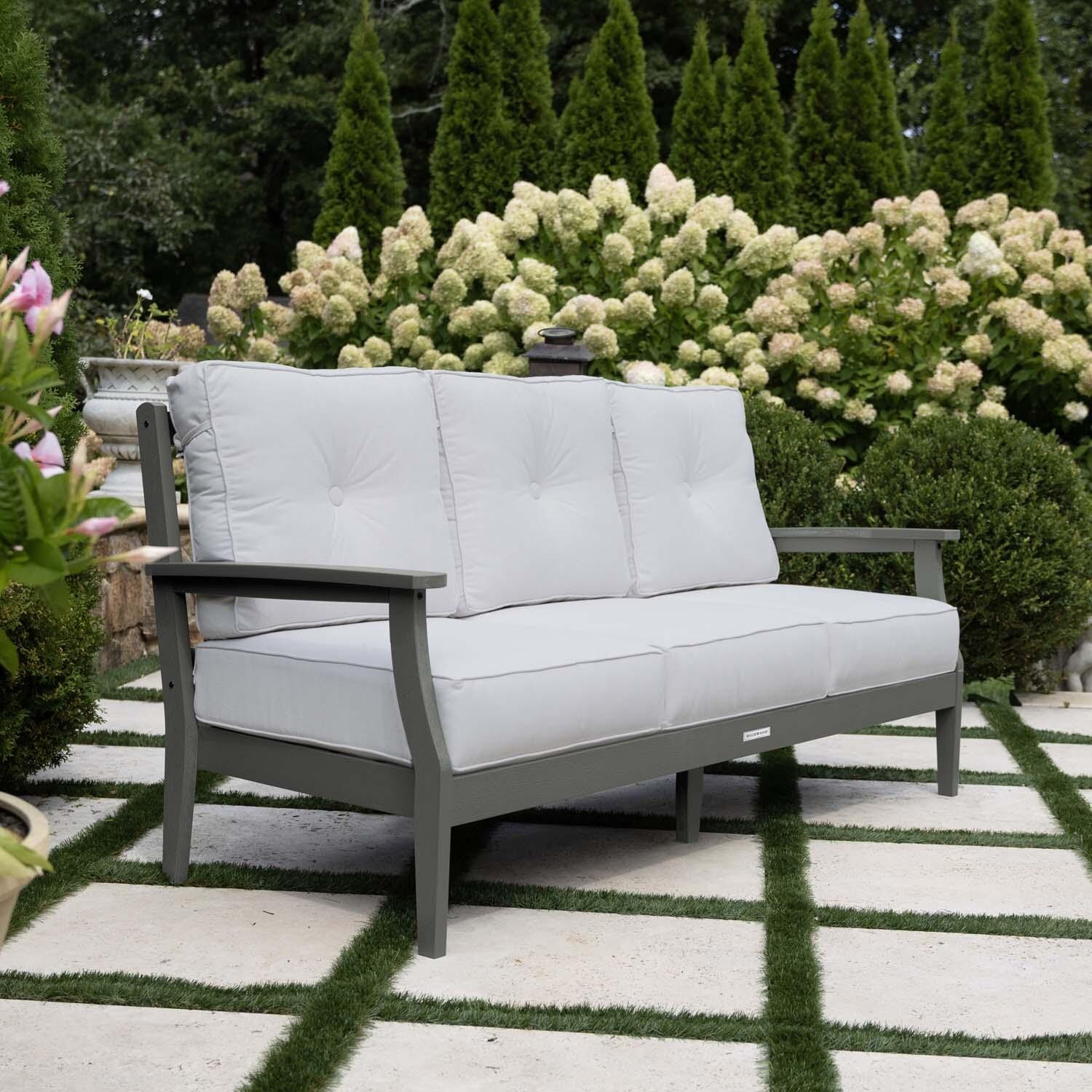 Blushing Bay 3 Person Recycled Plastic Sofa in Bliss Linen/Coastal Teak by Lakeview Outdoor Designs - Side View - Lifestyle thumbnail