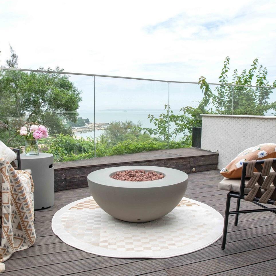 Roca OFG107-LP 34 Inch Round Concrete Propane Fire Pit Table in Gray By Elementi - Balcony View - Off - Lifestyle thumbnail