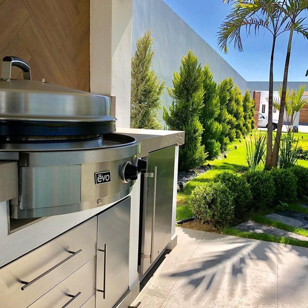 EVO 10-0095-NG-C Affinity 25G Built-In Flattop Propane Gas Grill w/ Non-Stick Ceramic Clad Coating - Installed in Outdoor Kitchen Side View - Lifestyle thumbnail