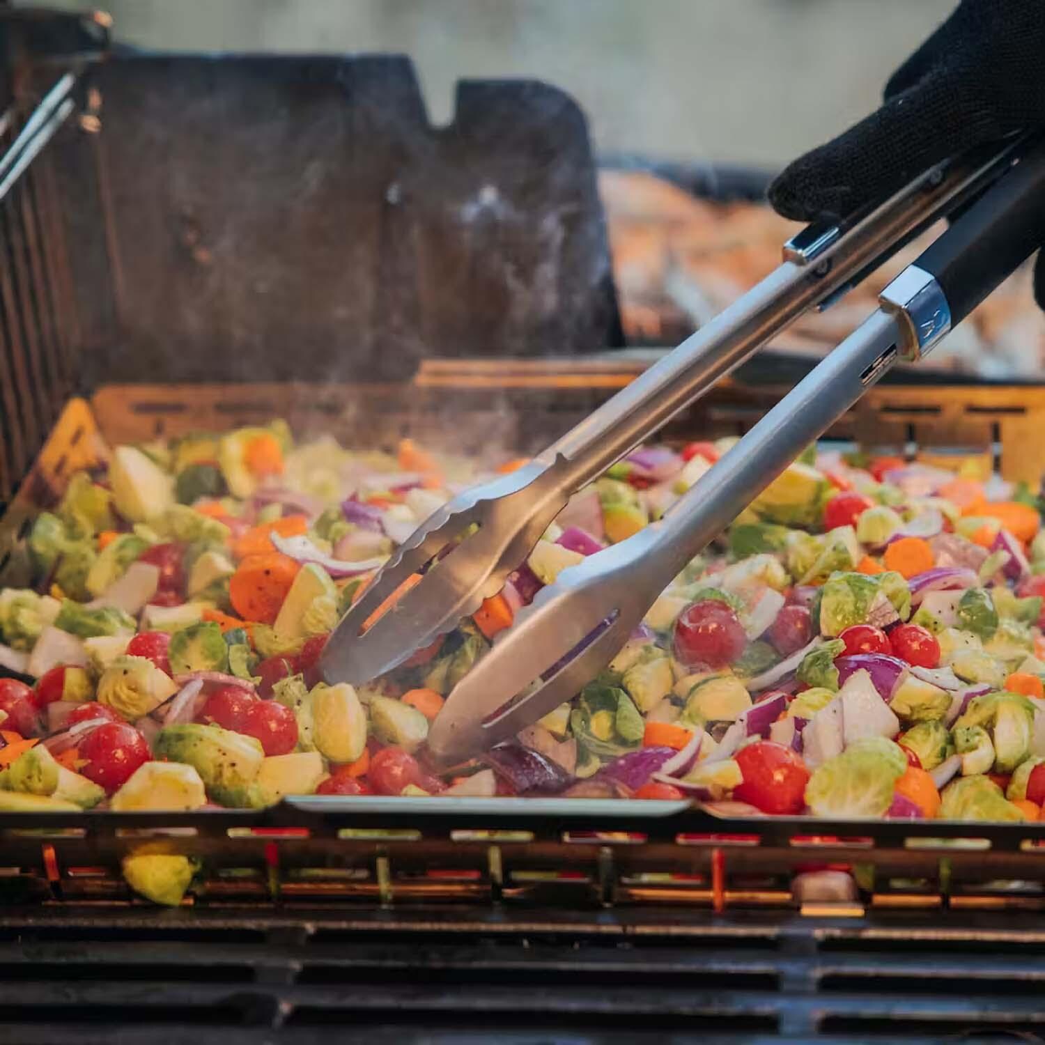 Weber 7673 CRAFTED Roasting Basket - Roasting Veggies Side View - Lifestyle thumbnail