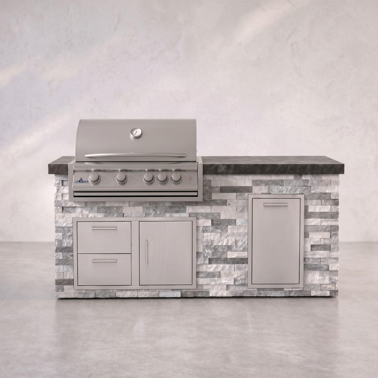 BBQGuys Signature 6 Ft Grill Island w/ 32 Inch Propane Blaze Premium LTE+ Grill, Narrow Trash Bin & Door & Drawer | Alaska Gray w/ Black Granite - Front - White Background thumbnail