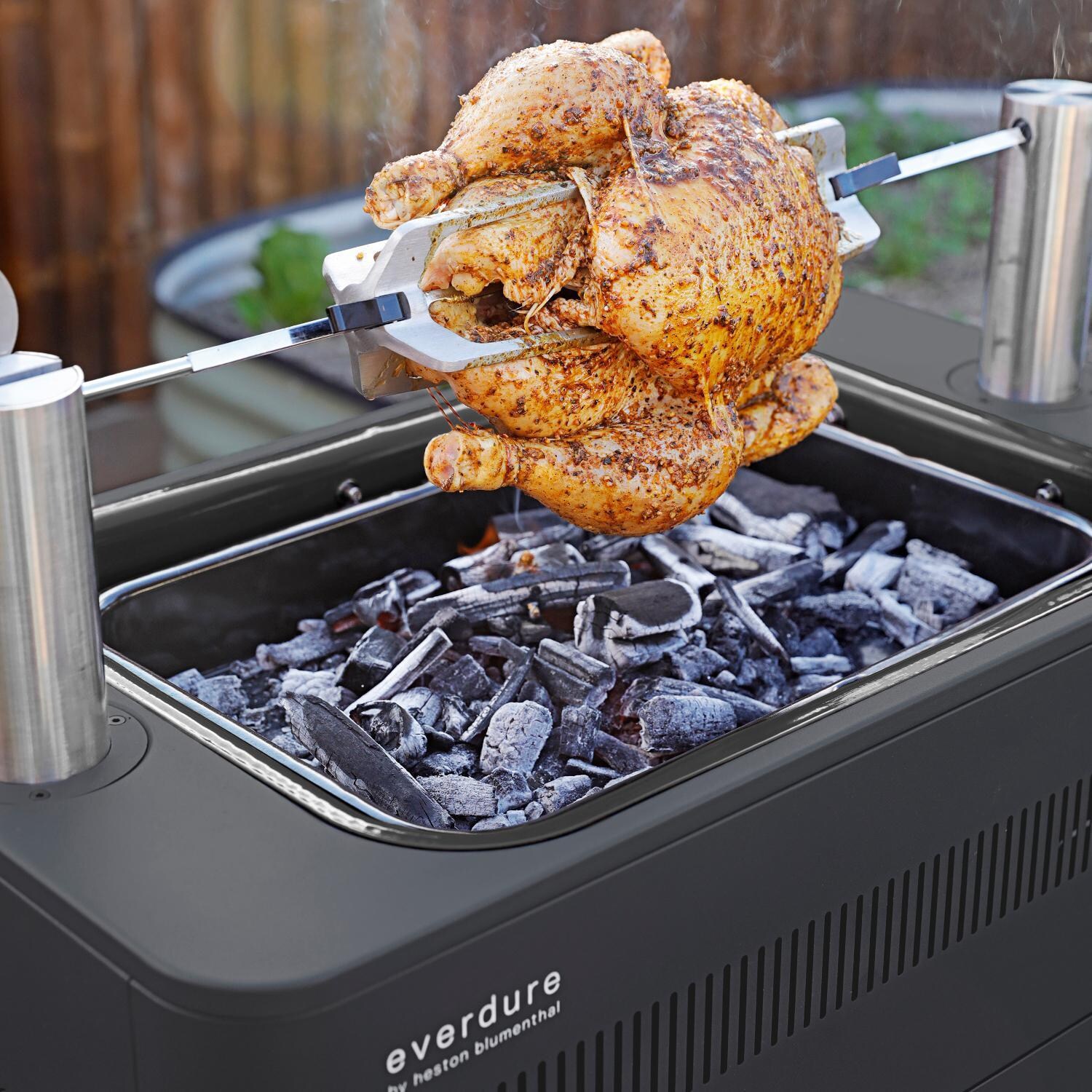 Everdure HBCE1BBSUS FUSION 29-Inch Charcoal Grill w/ Rotisserie & Electronic Ignition - Matte Black - Rotisserie Chicken - Lifestyle thumbnail