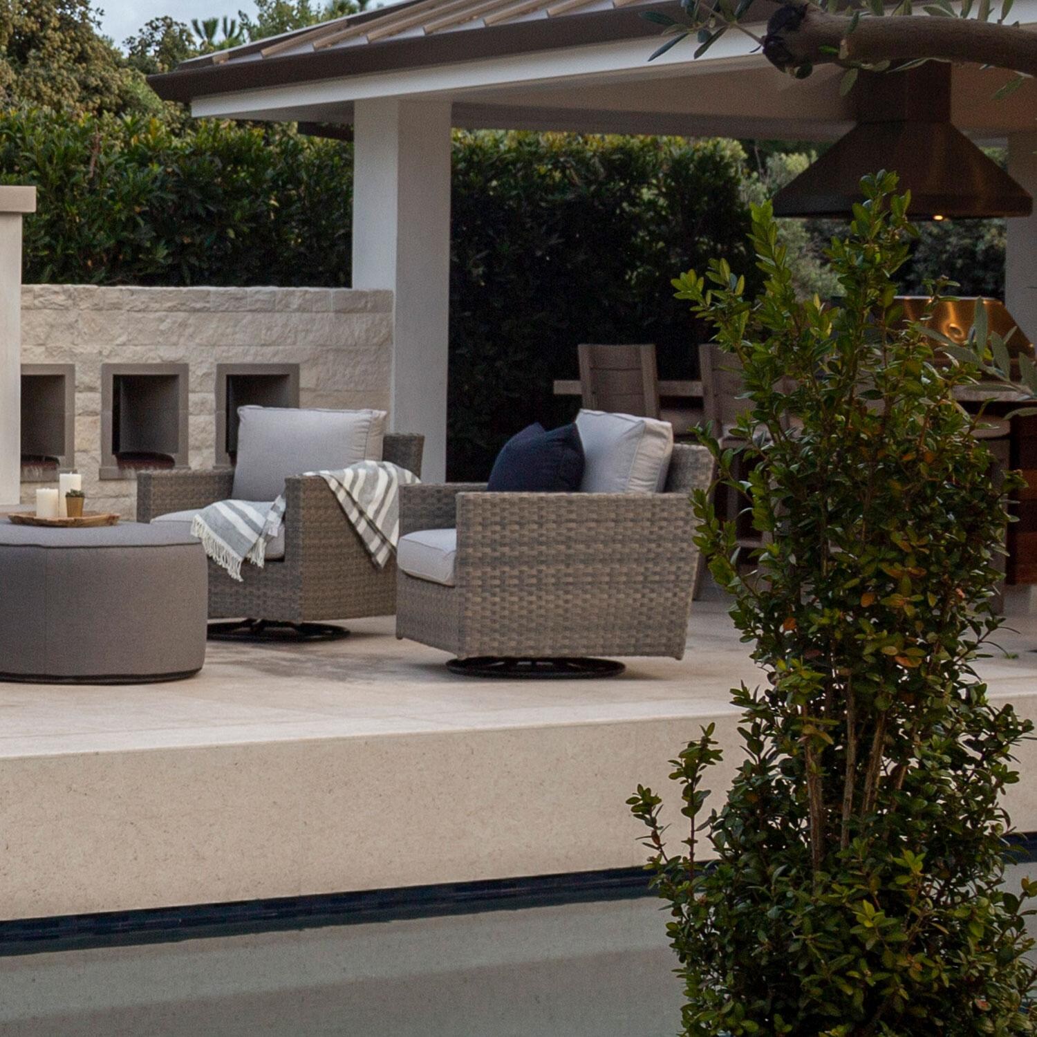 Coronado Wicker Patio Swivel Rocker Club Chair W/ Sunbrella Canvas Flax Cushions By Sunset West - By The Pool - Lifestyle thumbnail