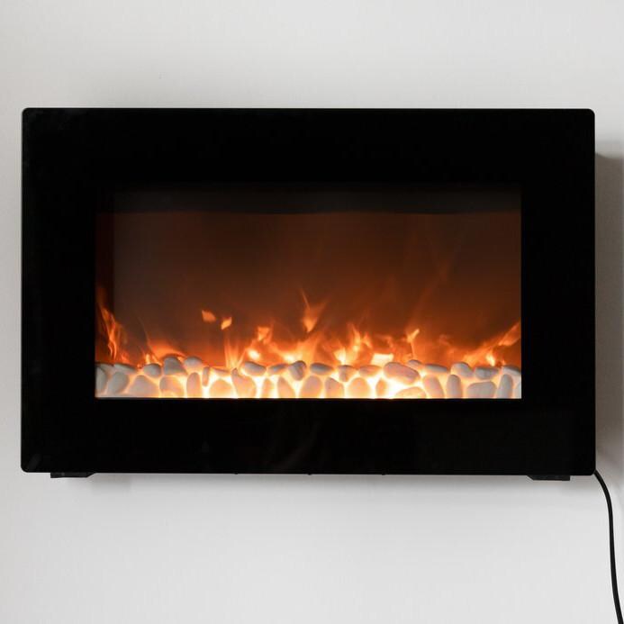 Fire Sense 31-Inch Wall Mount Electric Fireplace - Black - 60757 - Front View with Rocks - Lifestyle Closeup thumbnail