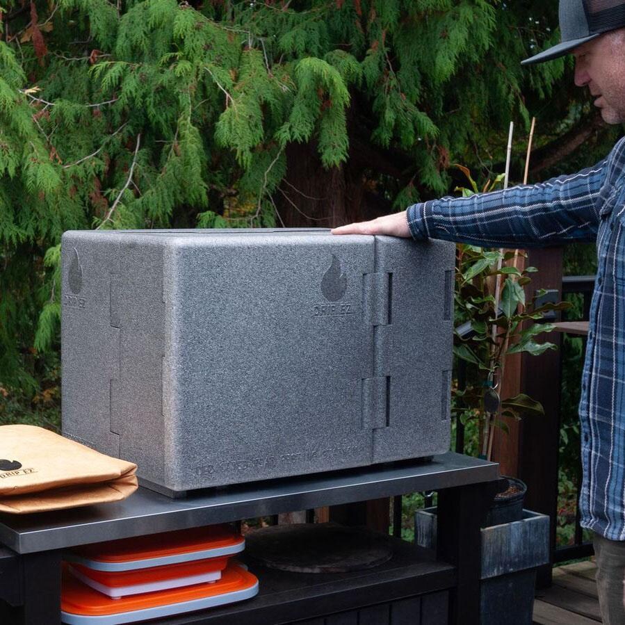 Drip EZ Que Crib and Tub Bundle - Classic Orange - Que Crib - Closed - Lifestyle thumbnail