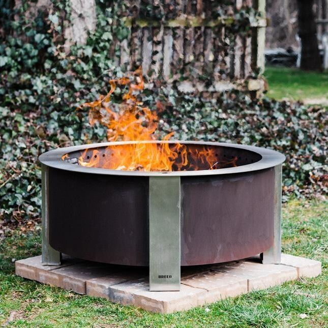 Breeo BR-X30P X Series 30 Inch Smokeless Round Corten Steel Wood Burning Fire Pit - In the Backyard - Lifestyle thumbnail
