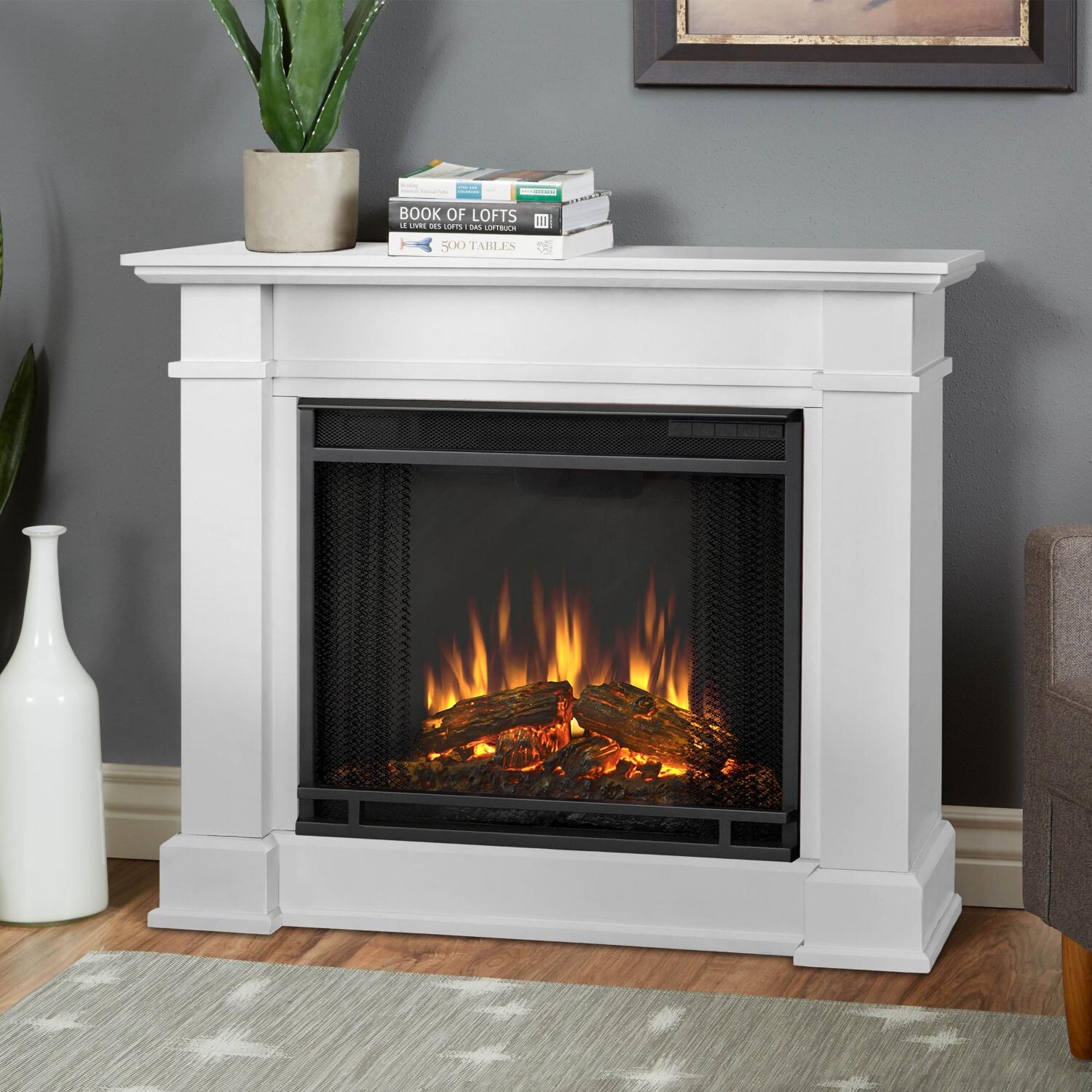 Real Flame Devin Petite 36-Inch Electric Fireplace With Mantel - White - 1220E-W : Gas Log Guys The sleek styling and compact profile of the Devin Petite collection makes it an ideal electric fireplace for smaller spaces. Fireplace has a white finish and includes a mantel
