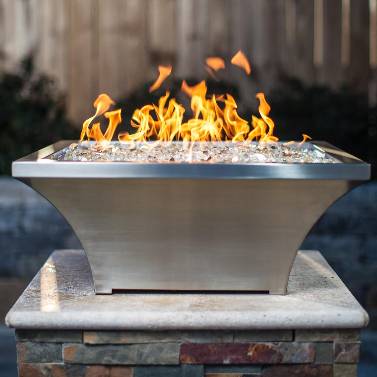 BBQGuys Signature Series Lavelle 24-Inch Square High-Rise Natural Gas Fire Bowl - Stainless Steel - Side View - Shown with 1/2 inch White Gold Reflective Fire Glass thumbnail