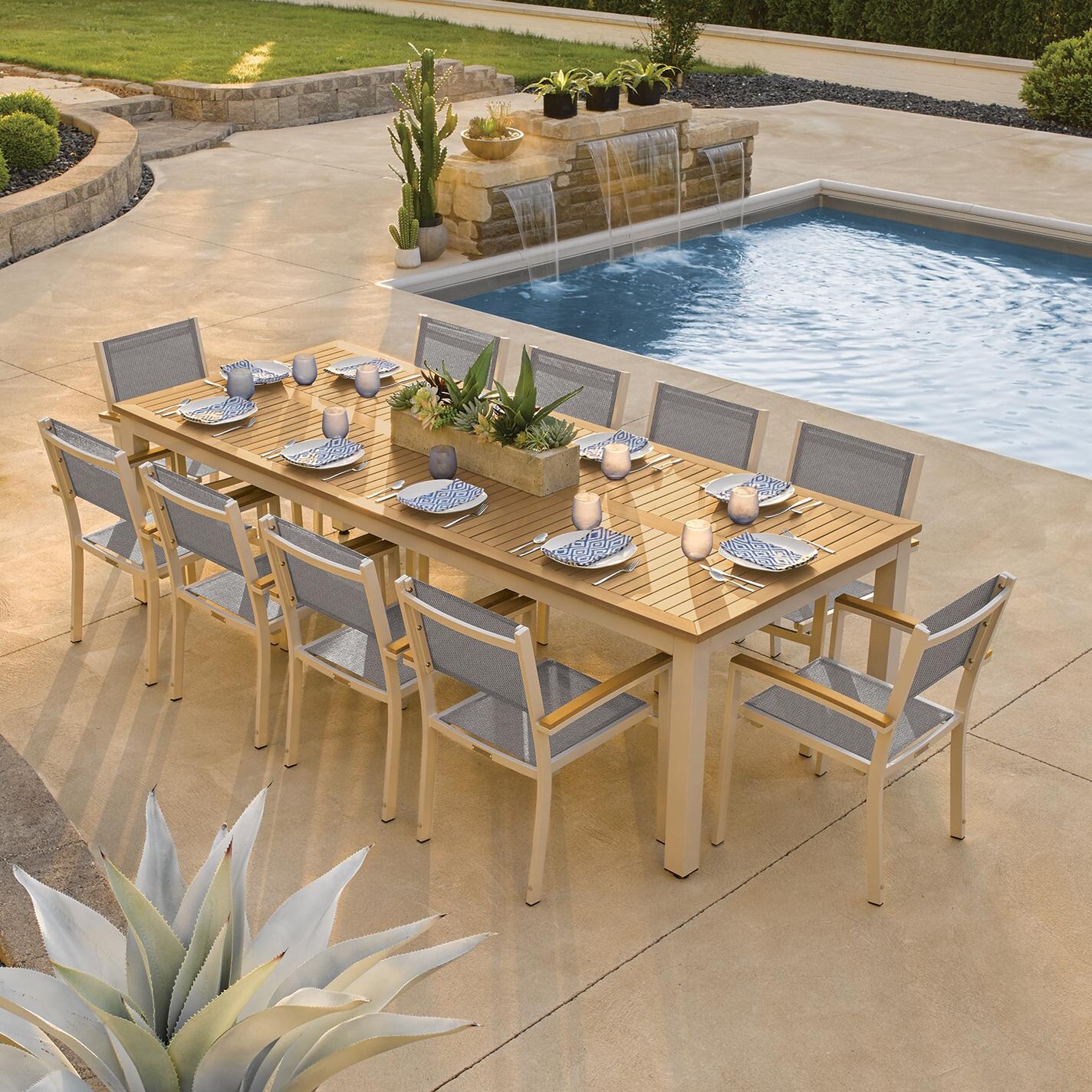 Travira 11 Piece Aluminum Patio Dining Set W/ 103 X 42 Inch Table and Tekwood Natural Tabletop By Oxford Garden - On The Patio thumbnail