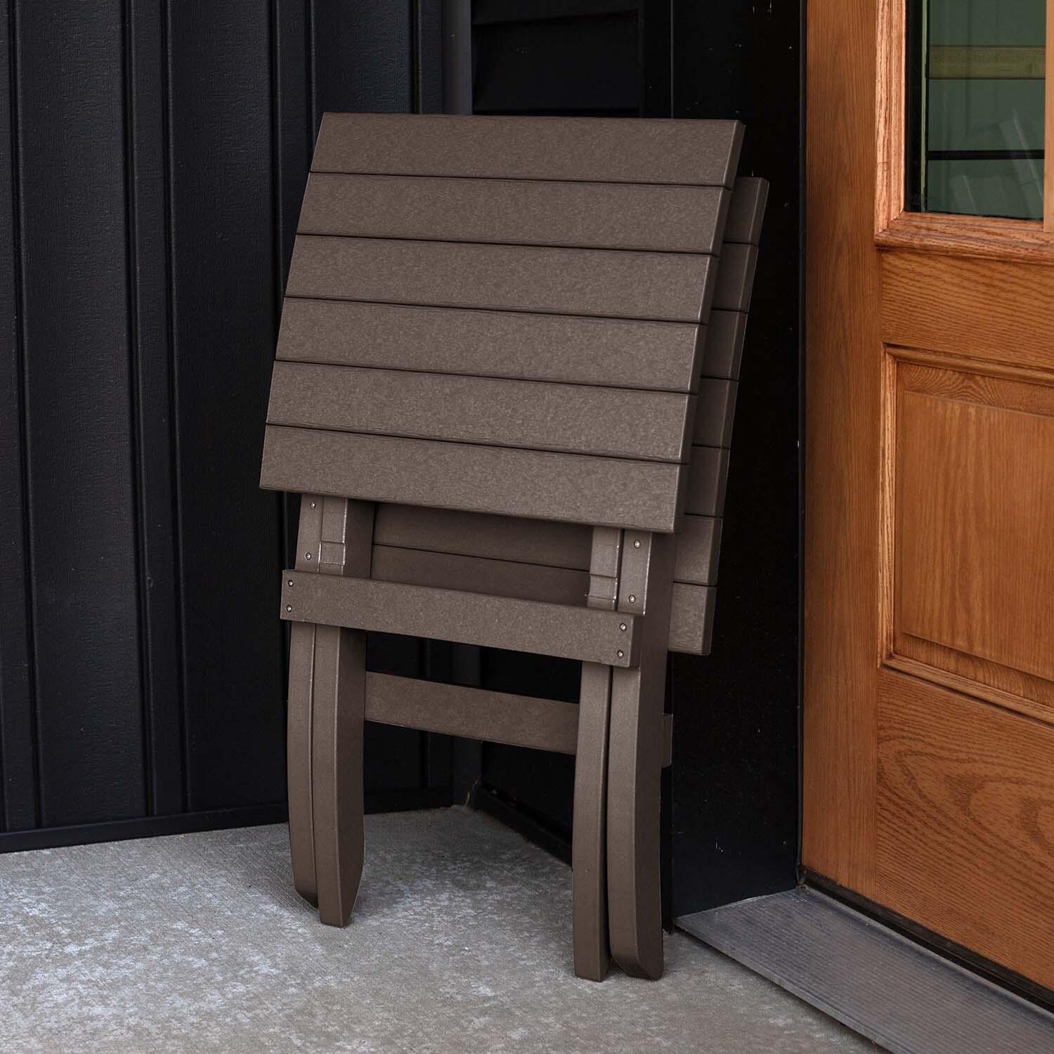 Hazel Cove Recycled Plastic Folding & Stacking Dining Side Chair in Mangrove Brown by Lakeview Outdoor Designs - Folded - Lifestyle thumbnail