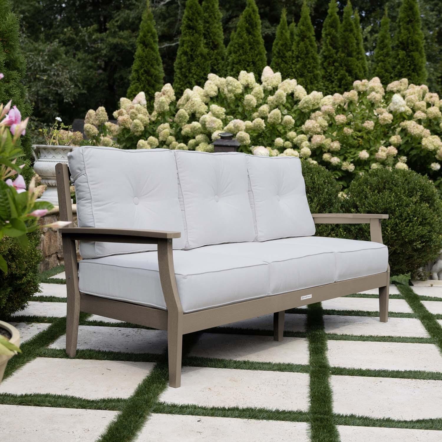 Blushing Bay 3 Person Recycled Plastic Sofa in Bliss Linen/Woodland Brown by Lakeview Outdoor Designs - Side View - Lifestyle thumbnail