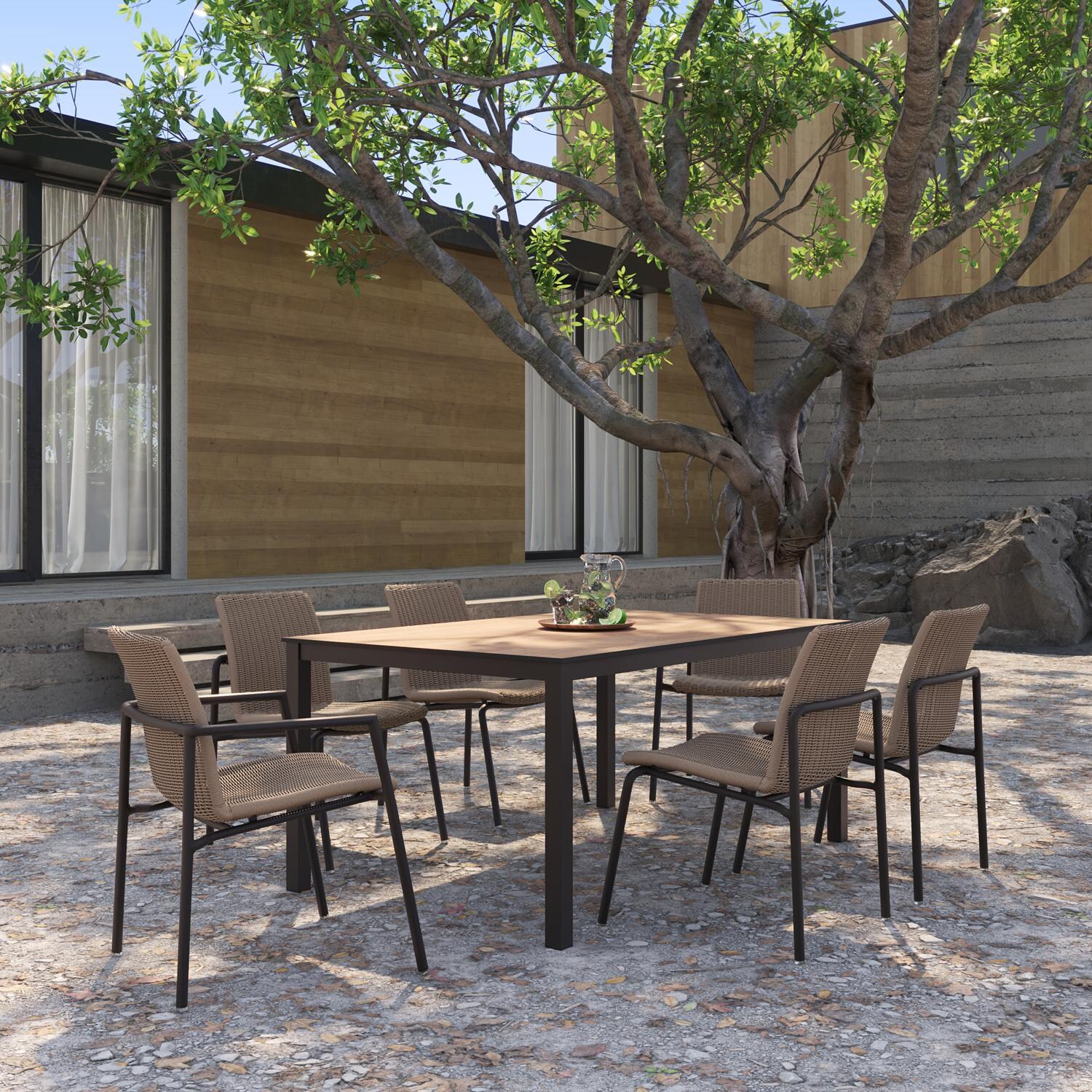 Oxford Garden Orso 7 Pc Wicker & Aluminum Dining Set W/ Enigma HPL Table Top in Carbon/Sand thumbnail