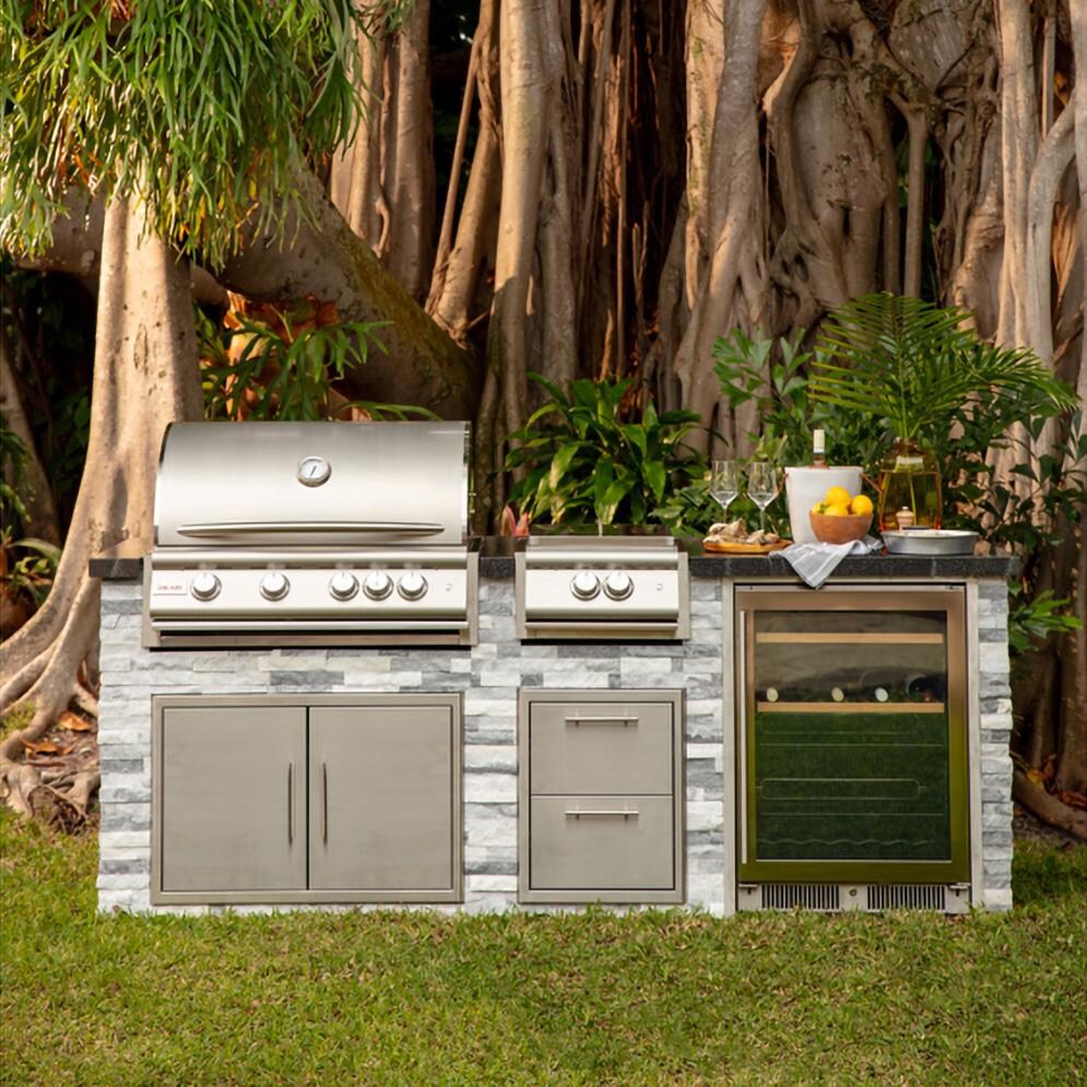 BBQGuys Signature 8 Ft Outdoor Kitchen Island w/ Blaze Premium LTE+ 32-Inch Natural Gas Grill, Premium LTE+ Power Burner, 24-Inch Beverage Cooler - Alaska Gray Stone w/ American Black Polished Granite - Island - Lifestyle thumbnail