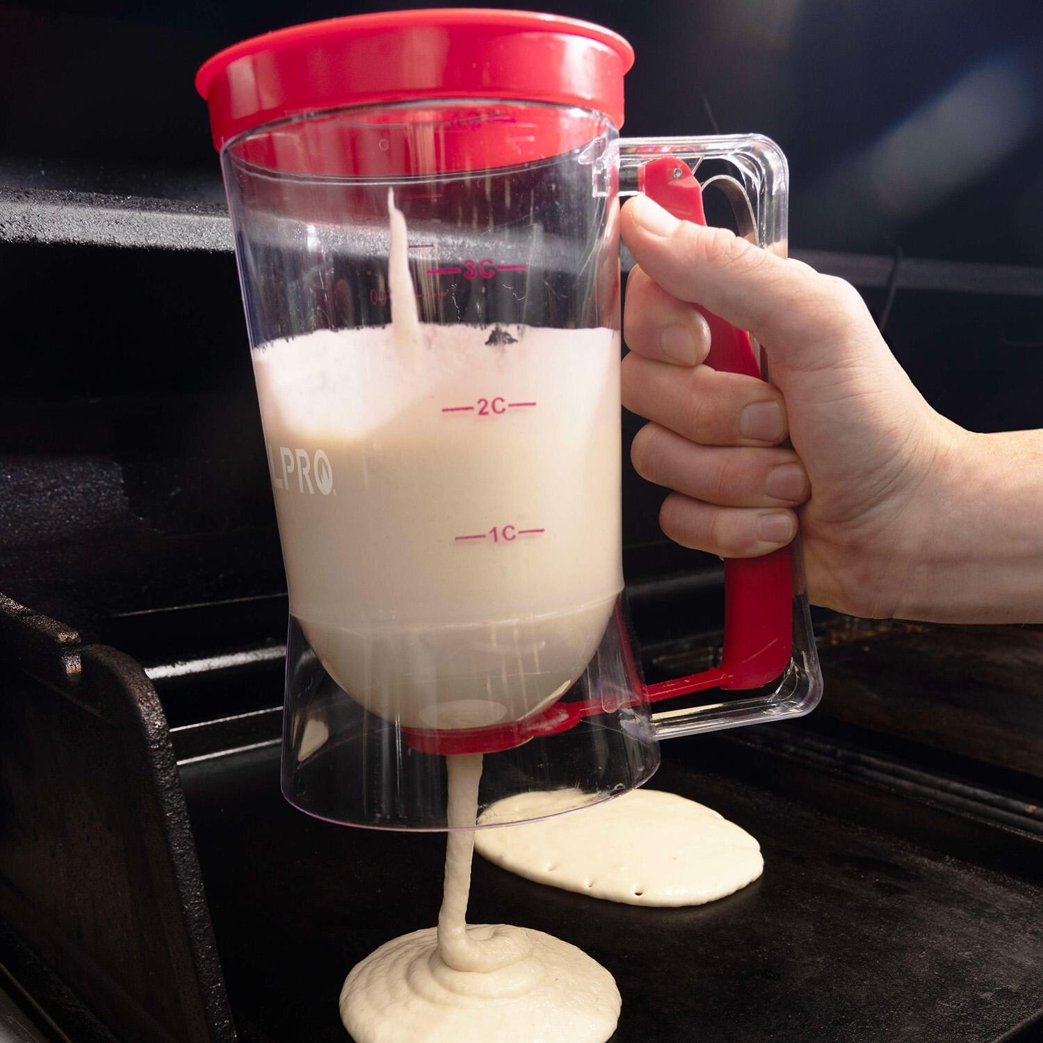 GrillPro Griddle Kit w/ Batter Dispenser, 2 Egg Rings & Stainless Steel Press - 91204 - Dispenser In Use - Lifestyle thumbnail