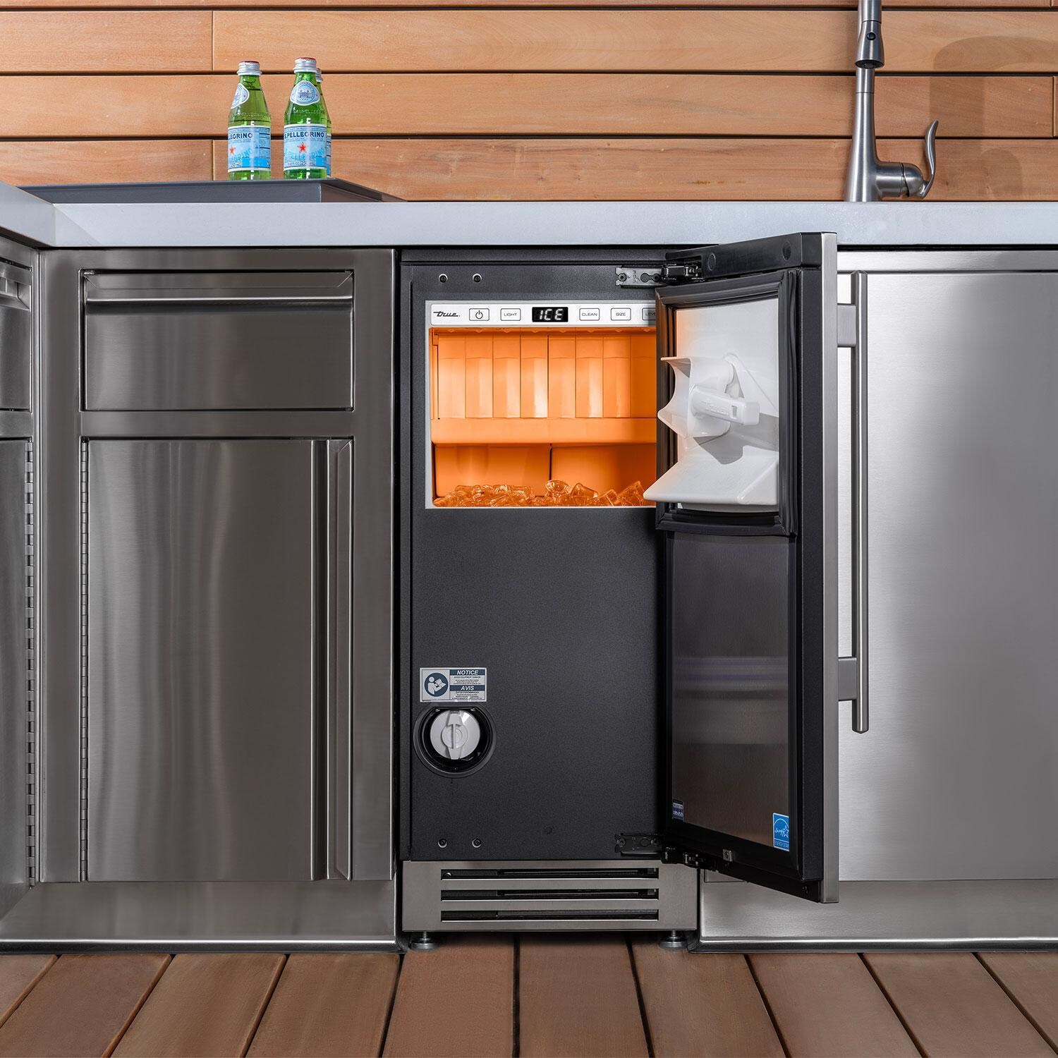 True TUI-15-L-SS-D 15-Inch 85 Lb. Left Hinge Outdoor Ice Maker - Stainless Steel - Interior - Installed in Island - Lifestyle thumbnail