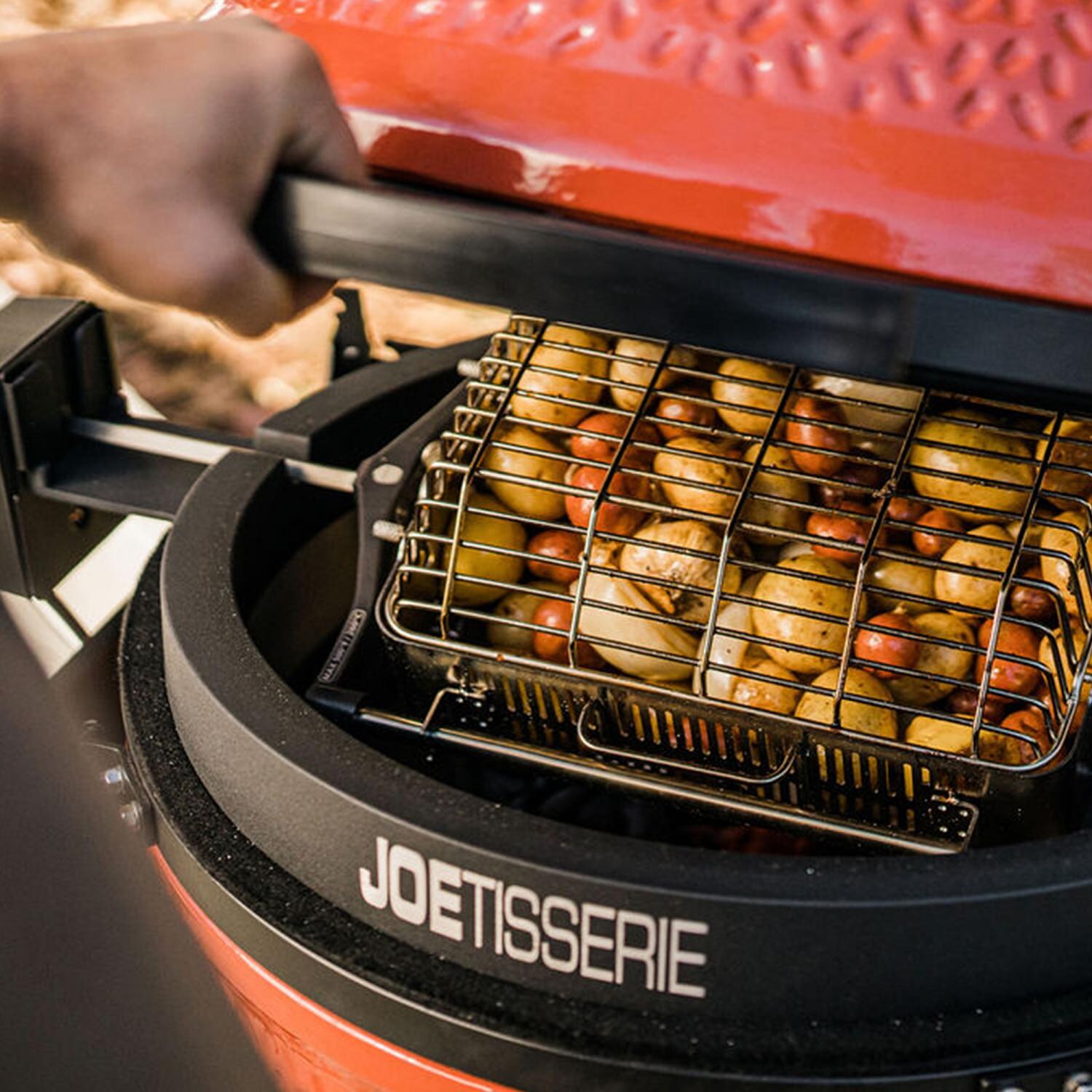 Kamado Joe® KJ15172022 JoeTisserie Basket Kit - Tumbler Basket In Use w/ Potatoes thumbnail