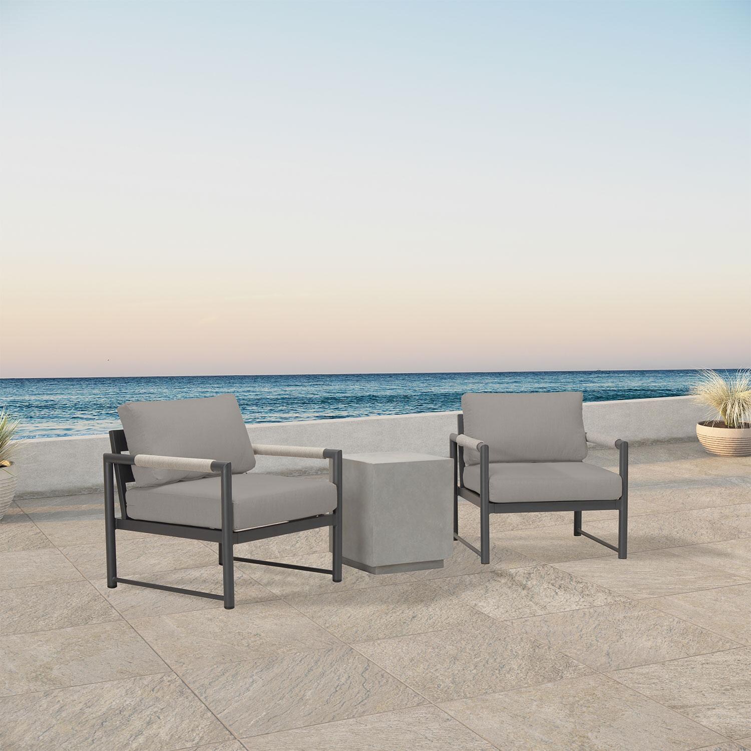 Lakeview AVEBAY-SL-PG-SET104-CC Avenue Bay Slate/Pebble Gray 3 Pc Chat Set - Canvas Charcoal - Angled On Patio - Lifestyle thumbnail