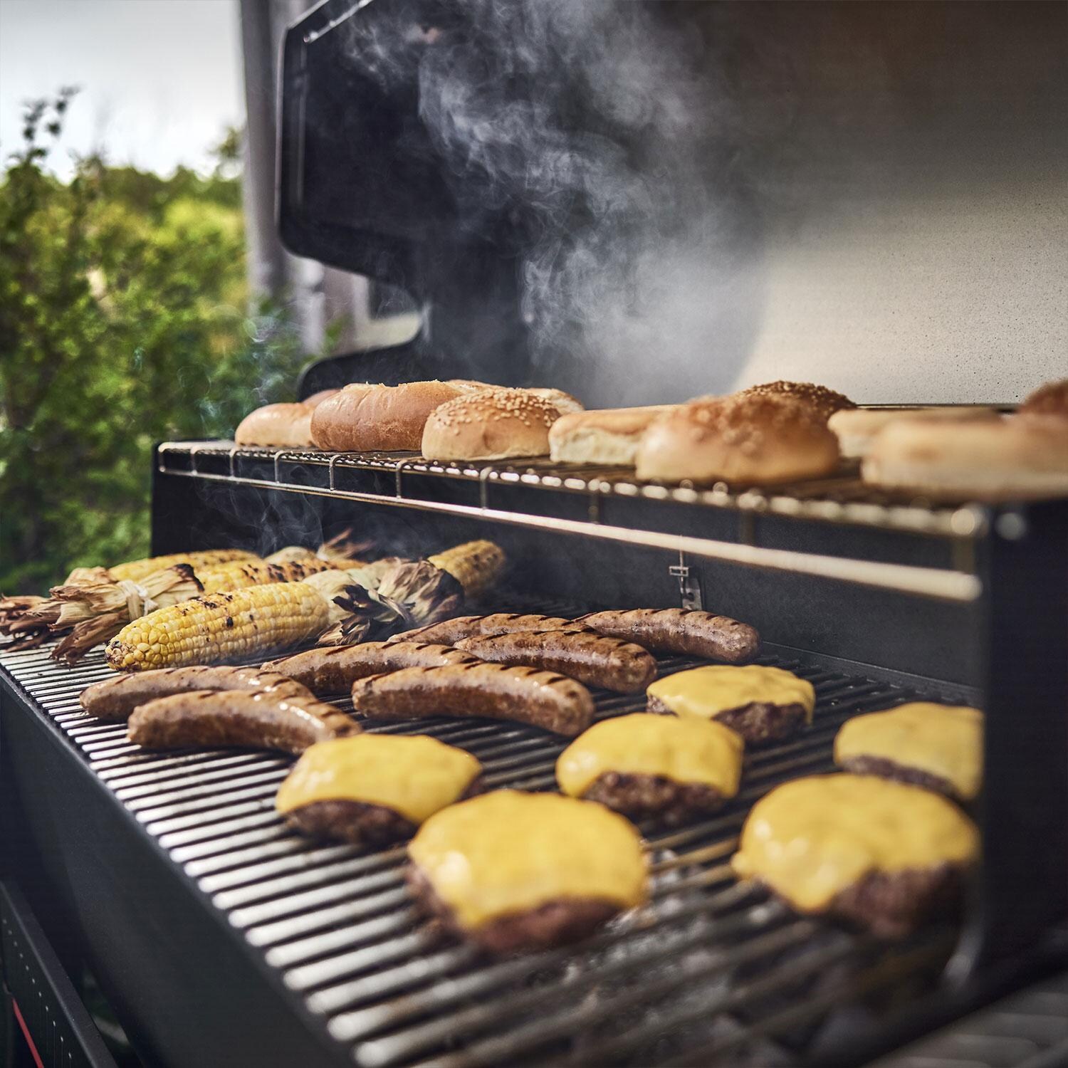 Weber 1500121 Searwood XL 600 Pellet Grill - Burgers, Sausage, & Corn - Lifestyle thumbnail
