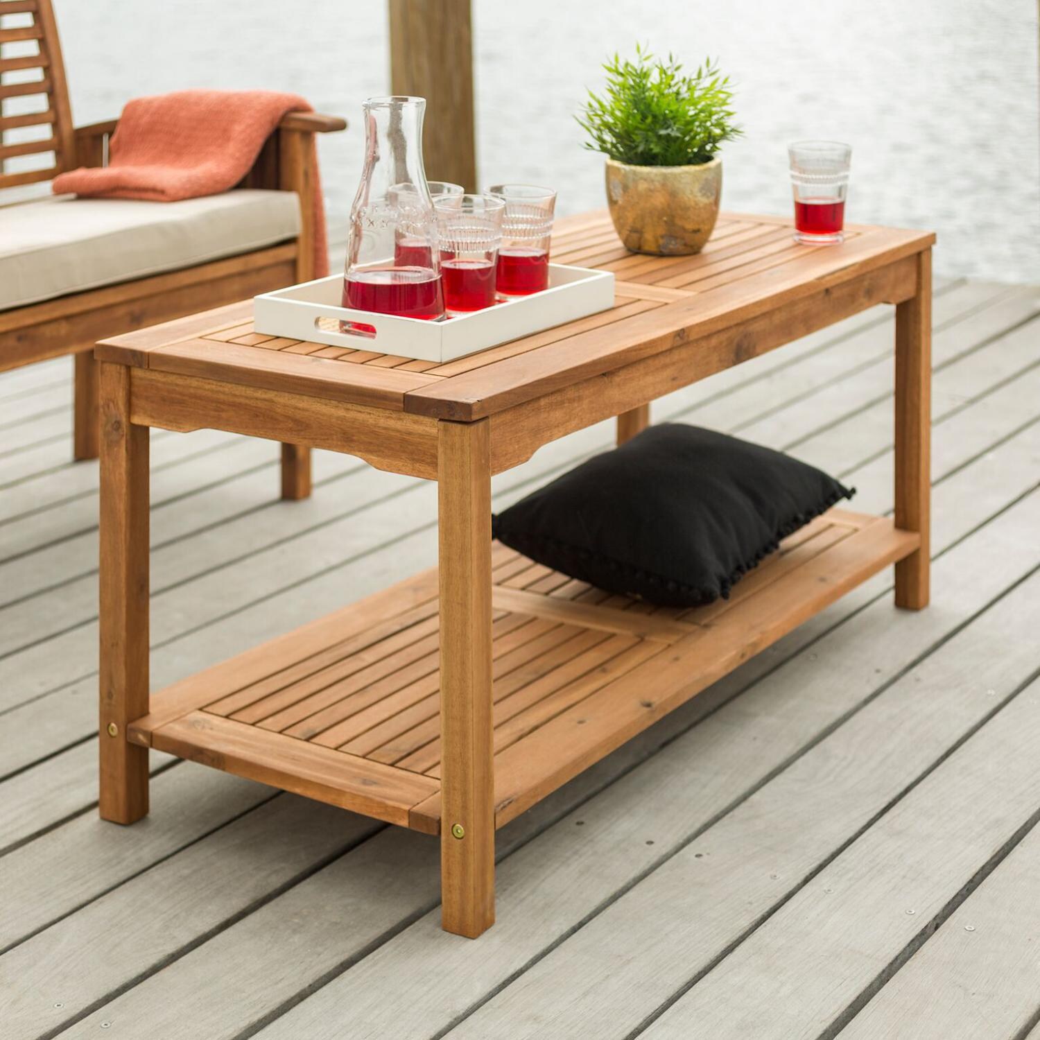 Ultimate Patio Horizon Way 50 X 21 Inch Rectangular Brown Acacia Patio Coffee Table - Angled View thumbnail