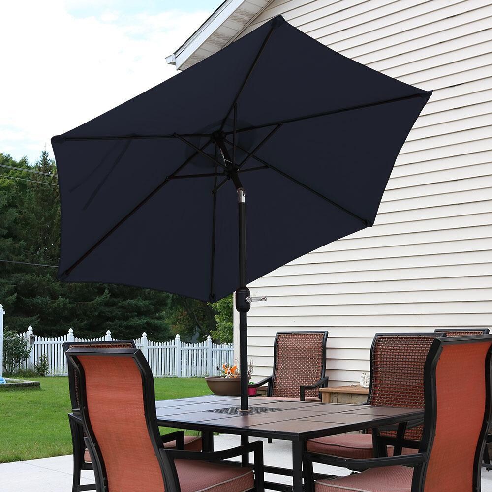 Ultimate Patio 7.5 Ft. Octagonal Aluminum Patio Umbrella W/ Crank & Tilt - Navy Blue - Tilted Lifestyle View thumbnail