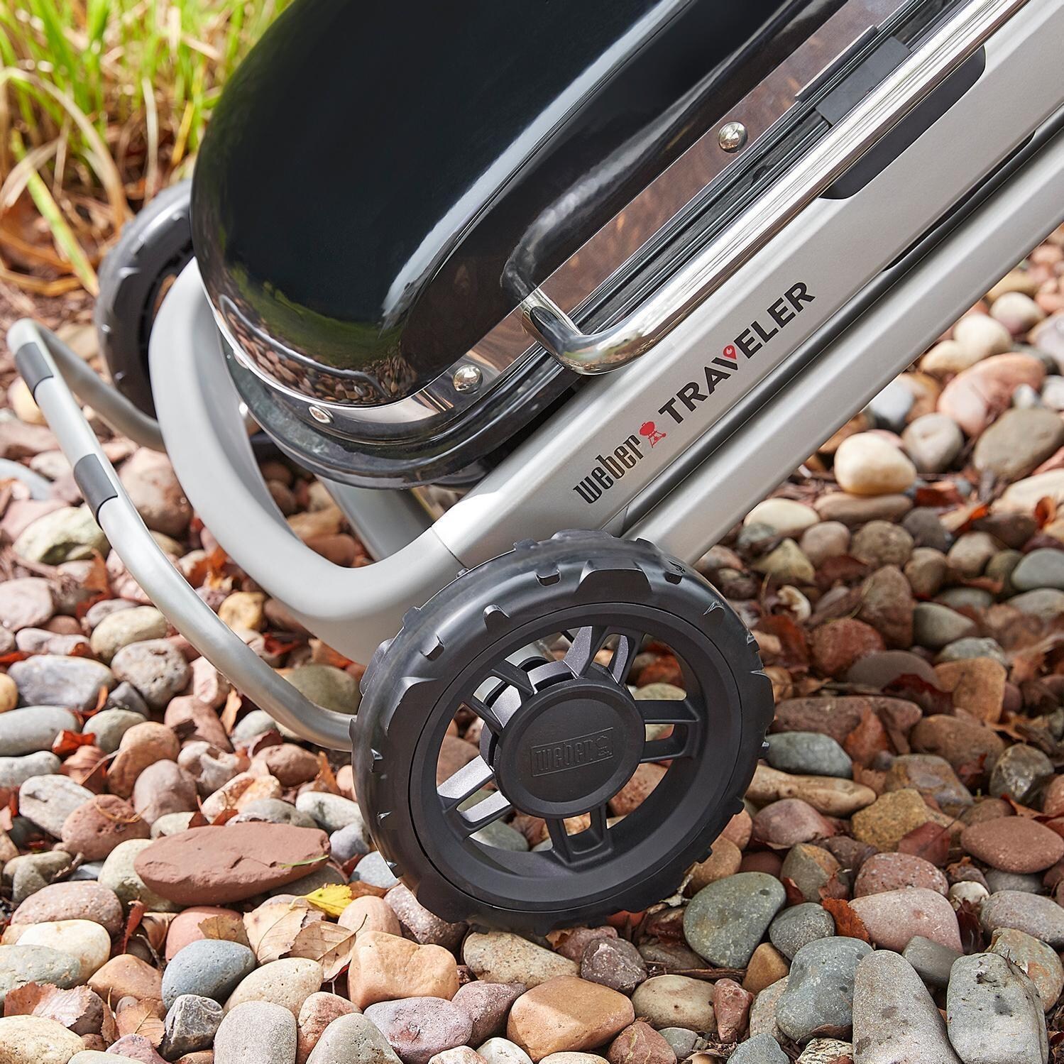 Weber Traveler 9010001 Portable Propane Gas Grill - Black - Wheel - Lifestyle thumbnail