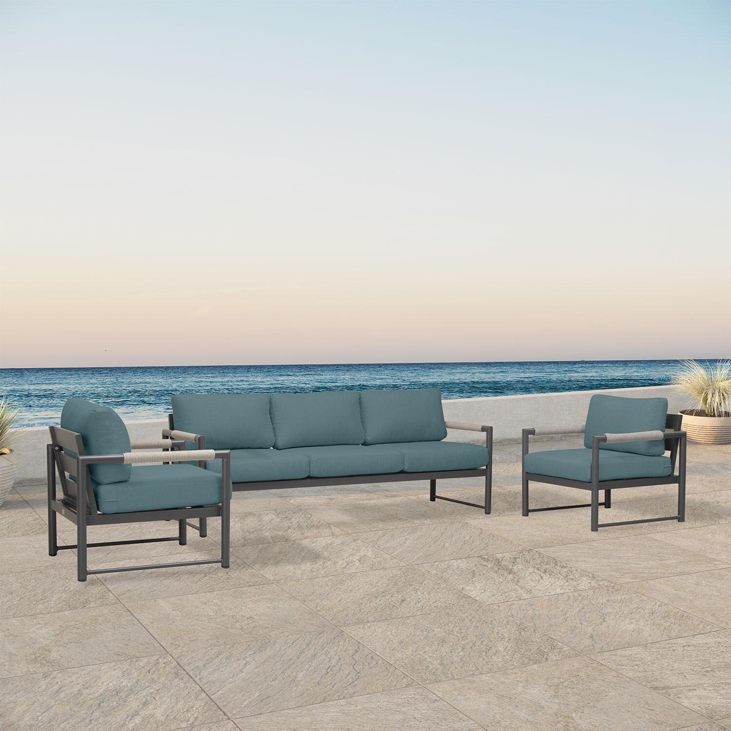 Lakeview AVEBAY-SL-PG-SET141-CL Avenue Bay Slate/Pebble Gray 3 Pc Sofa Club Chair Set - Cast Lagoon - Angled On Patio - Lifestyle thumbnail