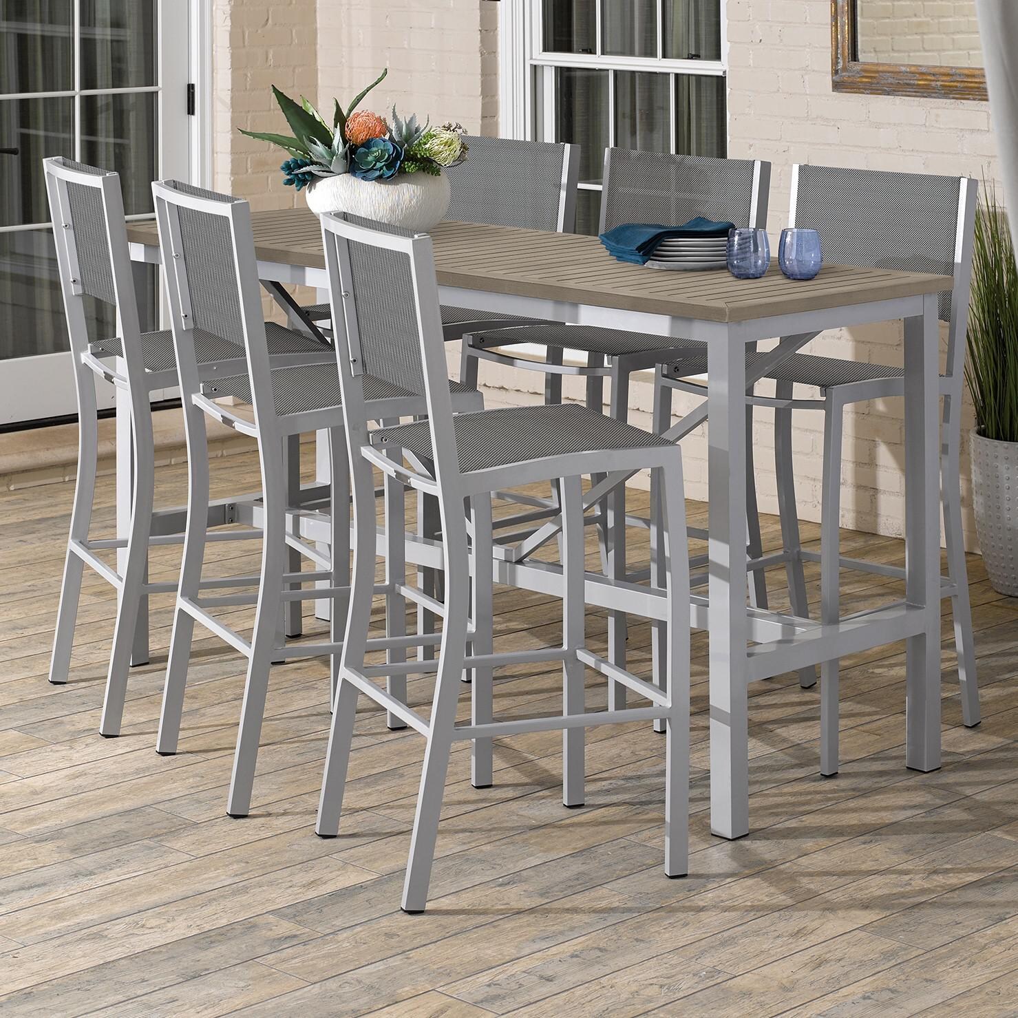Travira 7 Piece Aluminum Patio Bar Set W/ 72 X 30 Inch Rectangular Table and Tekwood Vintage Tabletop By Oxford Garden - On The Patio thumbnail