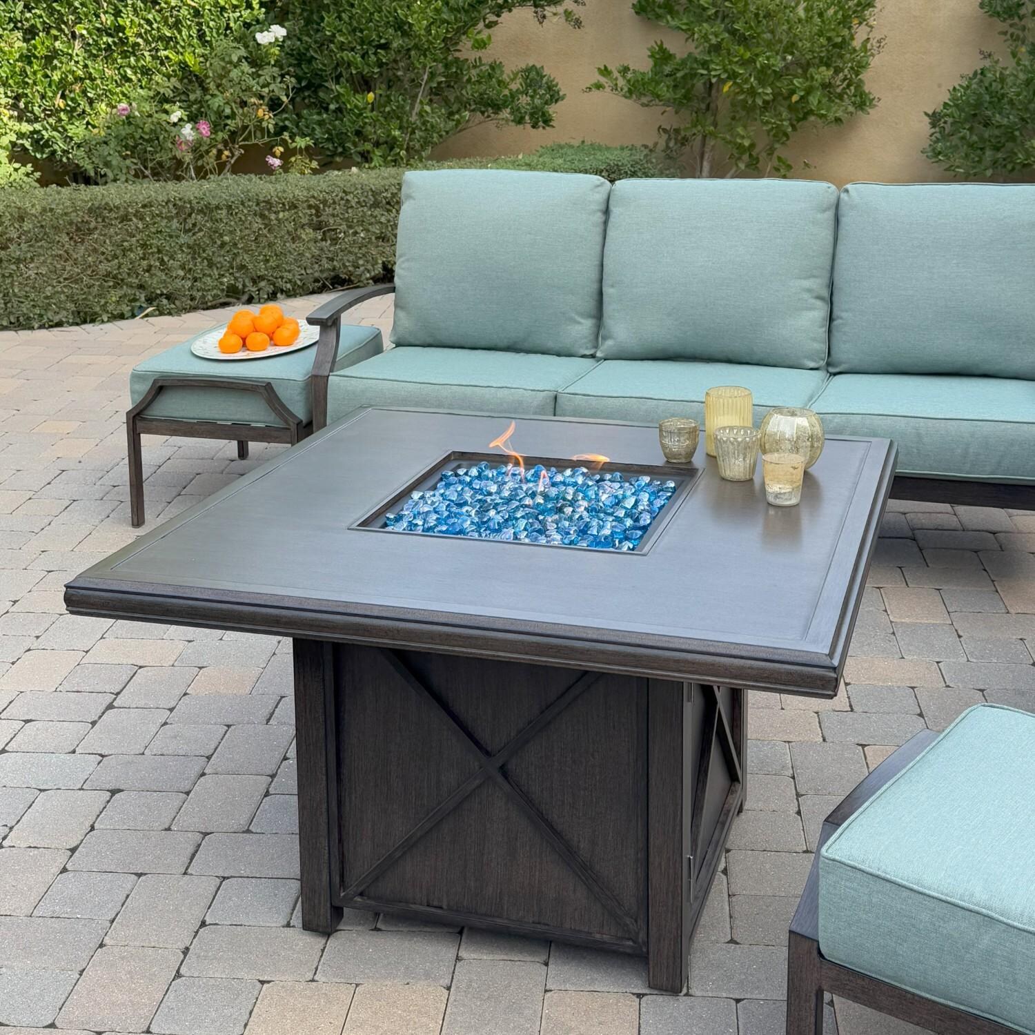 Atlantis 6 Pc Aluminum Fire Pit Seating Set w/ 2 Swivel Rocker Club Chairs, 2 Ottomans & Sofa in Walnut/Spa by Darlee - Fire Pit Table In Use - Lifestyle thumbnail