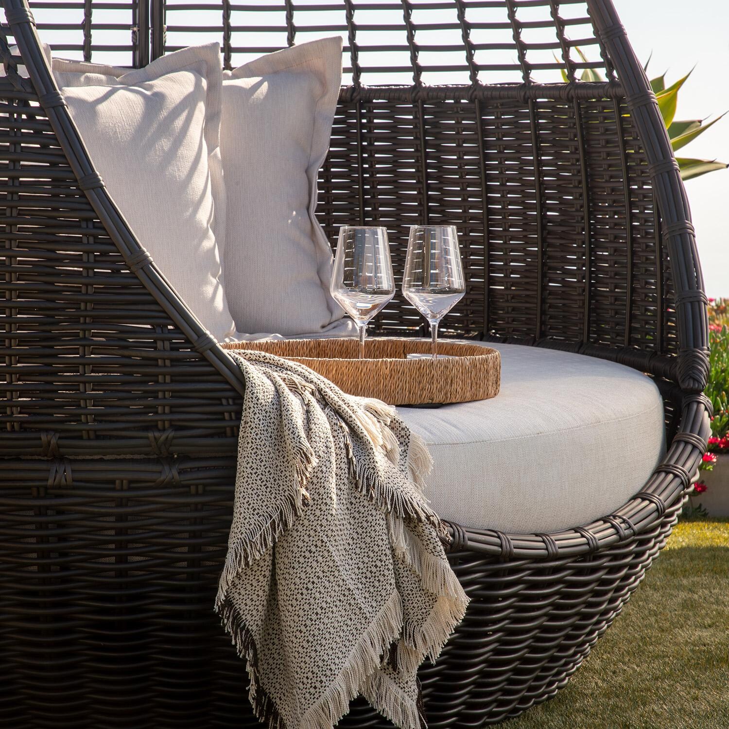 Cabo Resin Wicker Daybed in Kahlua/Soothe Pearl by Sunset West - Tray on Seat - Lifestyle thumbnail