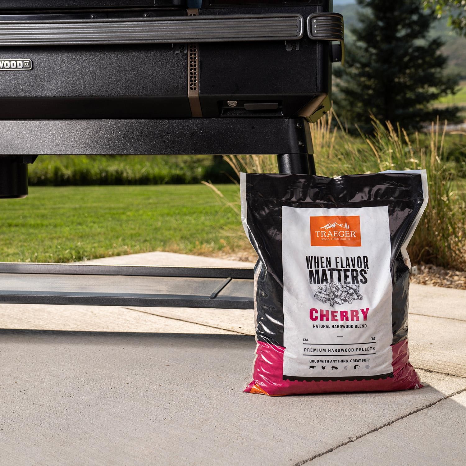 Traeger 20 Lb. Natural Hardwood Pellets - Cherry - On Patio - Lifestyle thumbnail