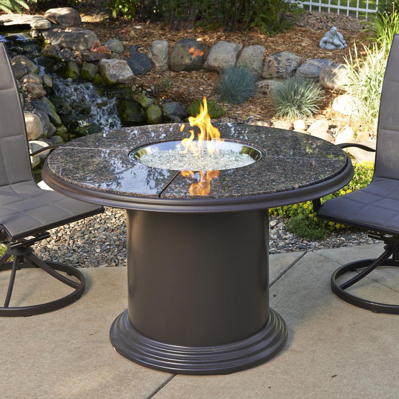 The Outdoor GreatRoom Company Grand Colonial Round Dining Height Gas Gas Fire Pit Table - British Brown - Lifestyle thumbnail