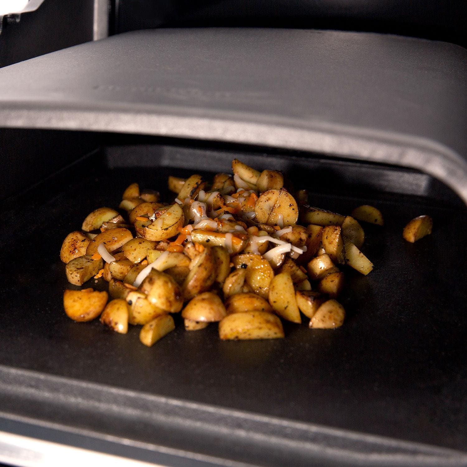 Broil King 69900 Cooking Dome - Cubed Potatoes on Grill - Lifestyle thumbnail