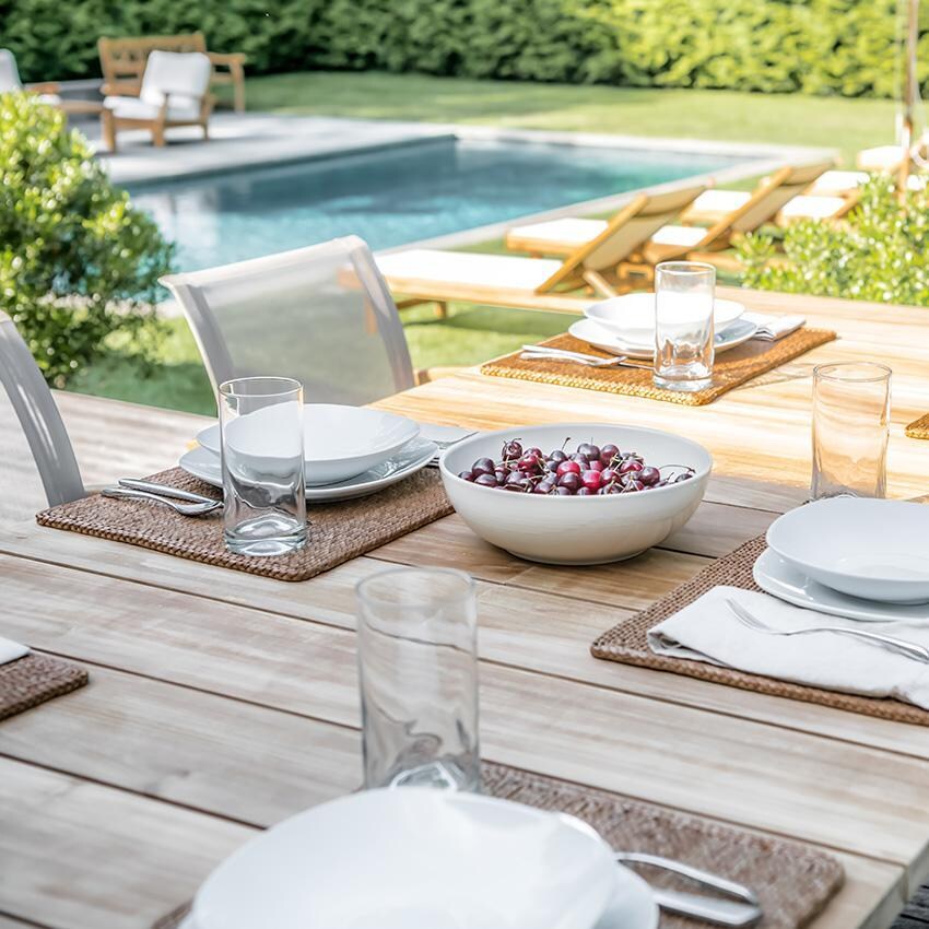 Teak + Table Capri Extend 72/96 Inch Dining Table W/ Extension - Dining up Close on Table - Lifestyle thumbnail