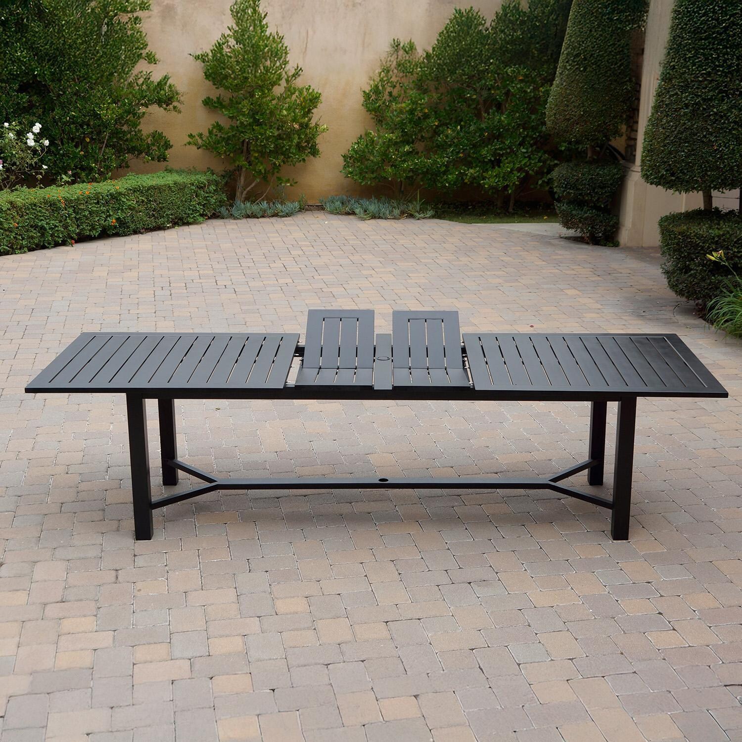 Darlee B/DL13-11PCDR-2350LE-R Nassau 11 Pc Cast Aluminum Dining Set w/ Rocker in Antique Bronze w/ Red Cushions - Table Side View w/ Extension - Lifestyle thumbnail