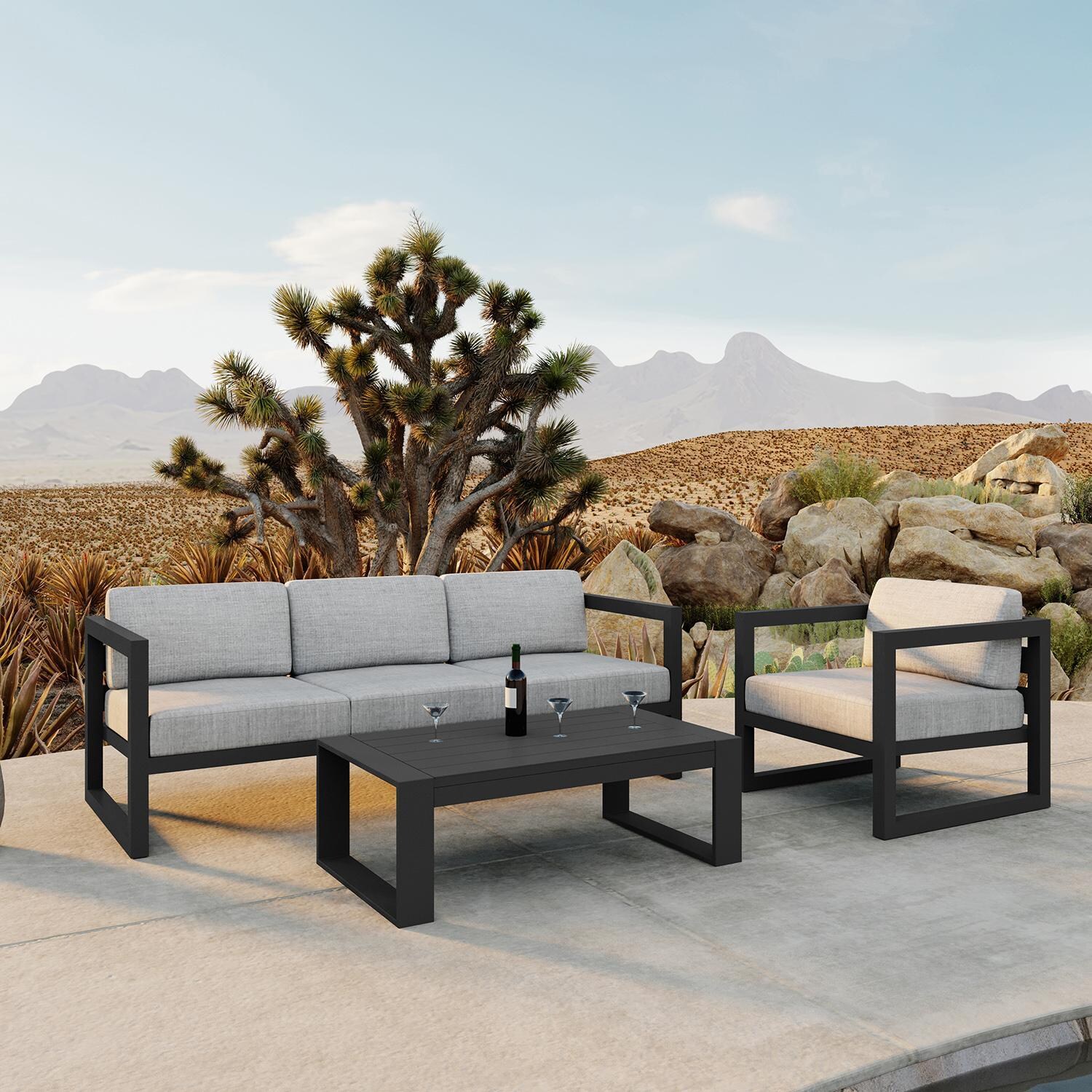 Misty Cove 3 Piece Seating Set In Slate w/Portal Coffee Table & Cast Silver Cushions by Lakeview - Lifestyle thumbnail