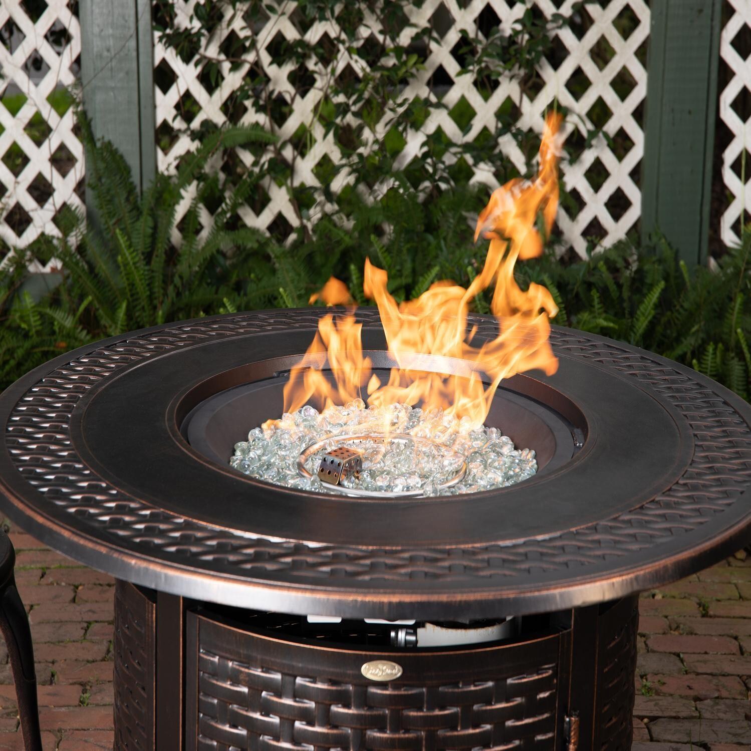 Ultimate Patio Welcome View 50,000 BTU Propane Round Fire Pit Table - Woven Cast Aluminum -  In Use - Detail thumbnail