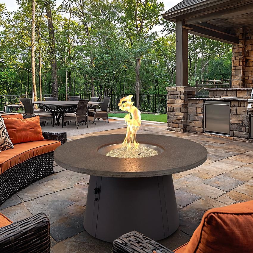 Cirvalo 48 Inch Round Natural Gas Fire Pit in Fossil Brown/Brown by The Outdoor GreatRoom Company - Lifestyle thumbnail
