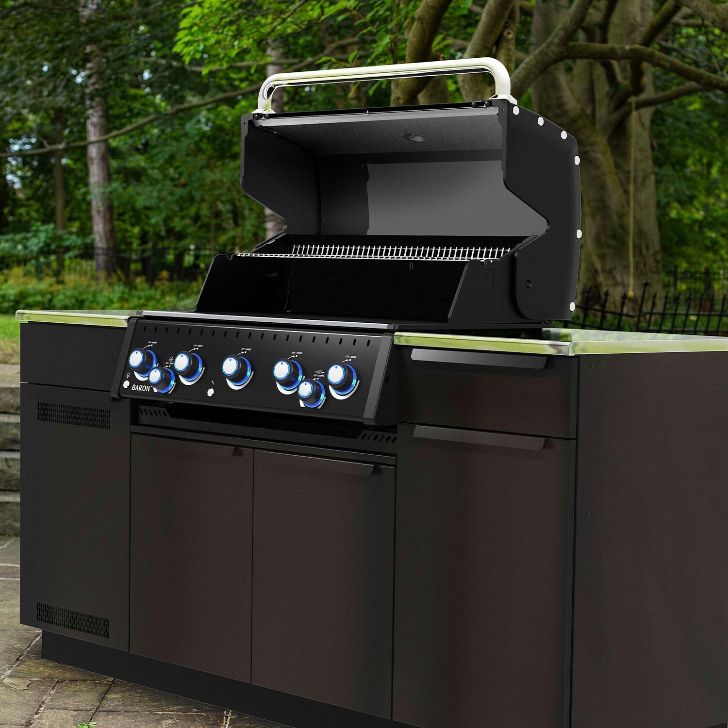 Broil King 876847 Baron 590i Shadow 5 Burner Natural Gas Grill Center w/ Rotisserie & Side Burner - Lid Up - On Patio - Lifestyle thumbnail