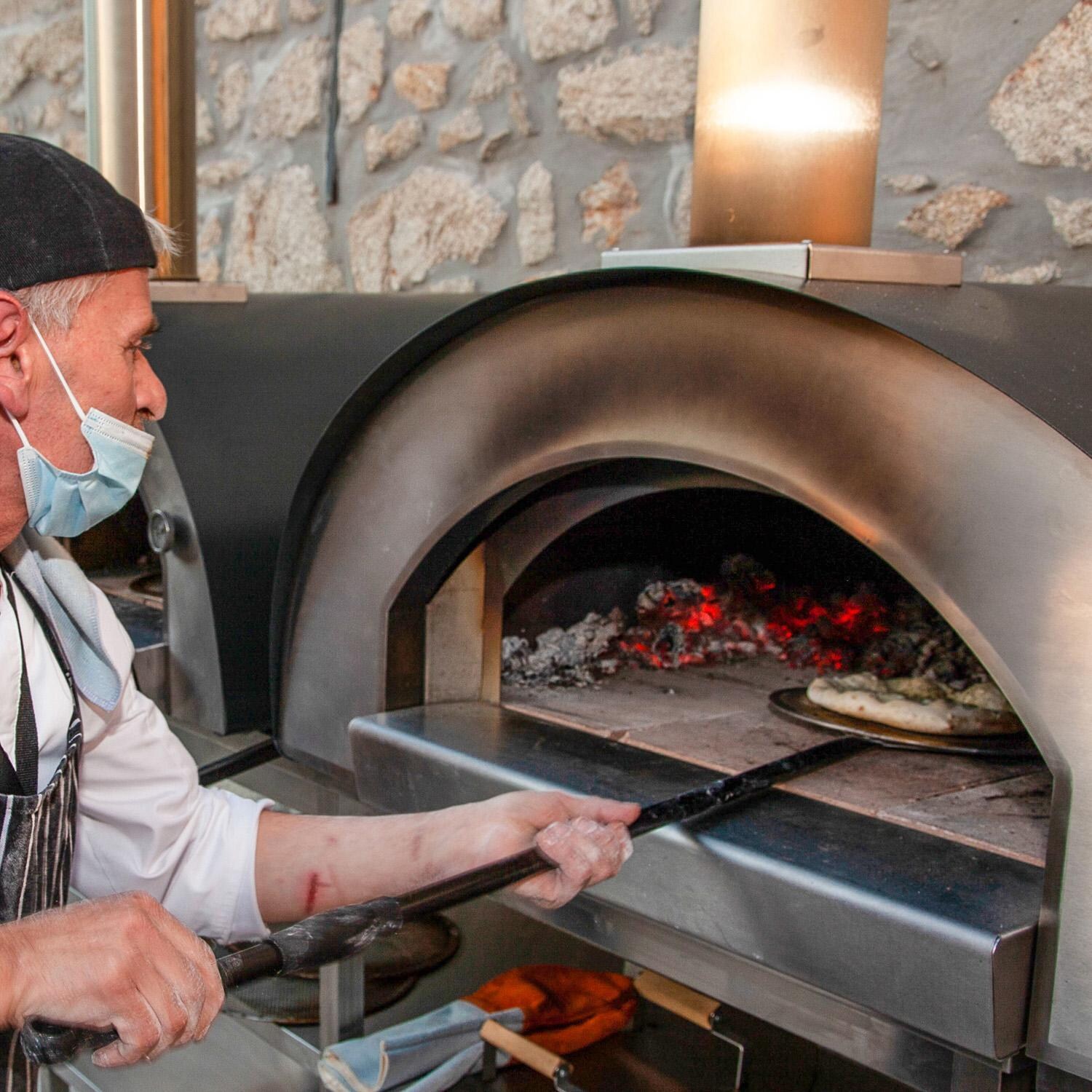 Cru CRUO90G1 Pro 90 Outdoor Wood-Fired Pizza Oven - Turning Pizza thumbnail