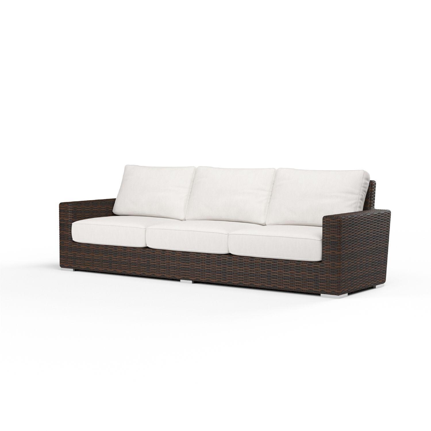 Montecito Wicker Patio Sofa W/ Sunbrella Canvas Flax Cushions By Sunset West - Left Angle - White Background thumbnail