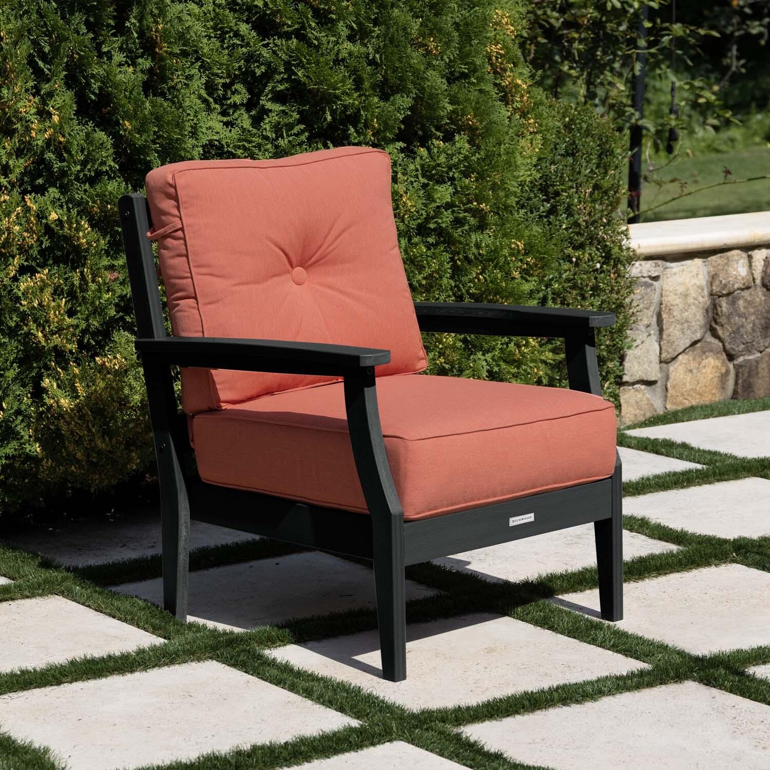 Blushing Bay Recycled Plastic Club Chair in Canvas Persimmon/Black by Lakeview Outdoor Designs - On Patio - Lifestyle thumbnail