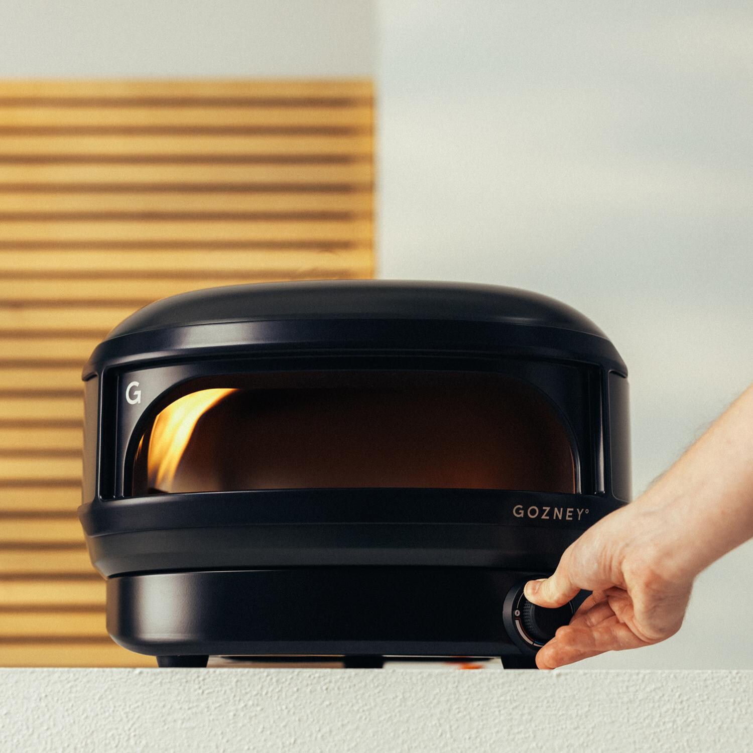 Gozney GAPOBUS1226 Arc Lite Propane Pizza Oven - Black - Control Knob - Lifestyle thumbnail