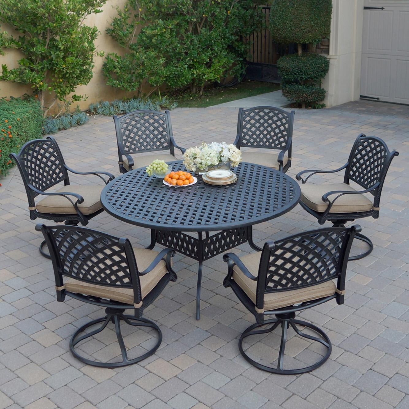 Nassau 7 Pc Cast Aluminum Dining Set w/ Rocker in Antique Bronze w/ Sesame Cushions By Darlee